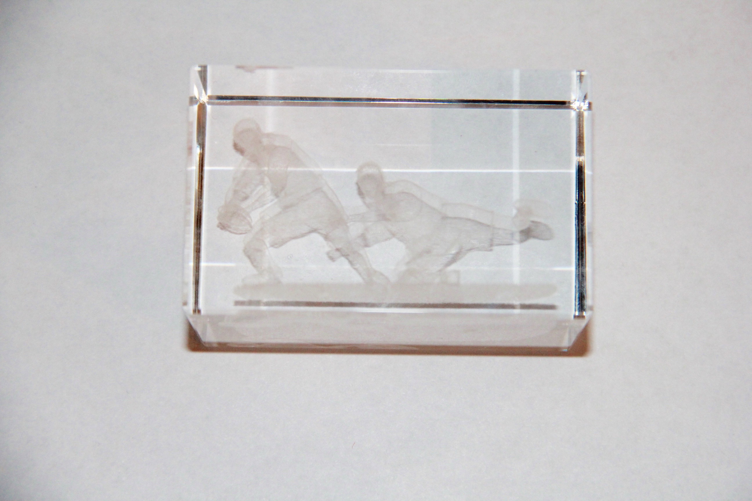 Pair of Sports Themed Lucite Paperweights