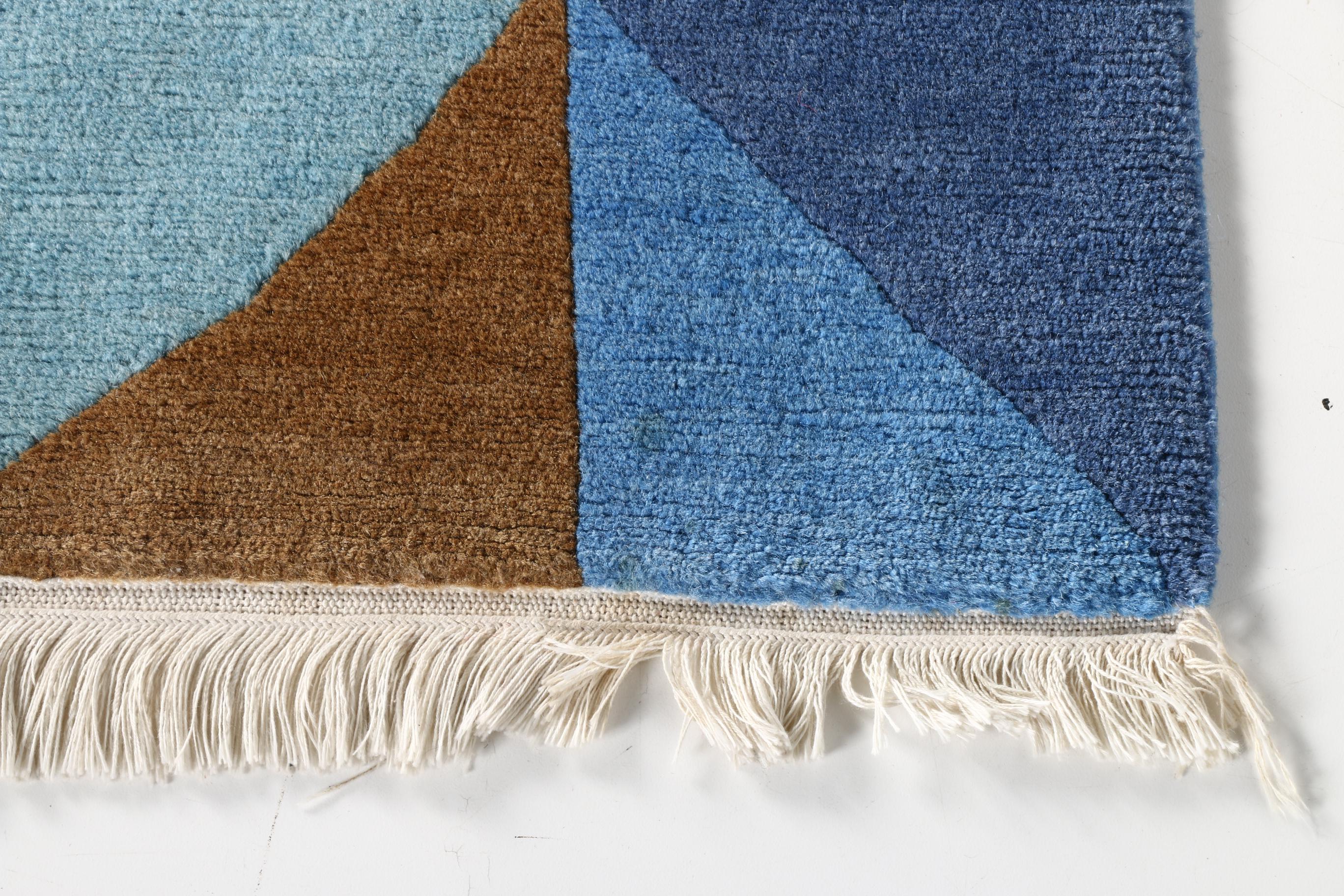 Hand Knotted Tibetan-Style Wool Area Rug