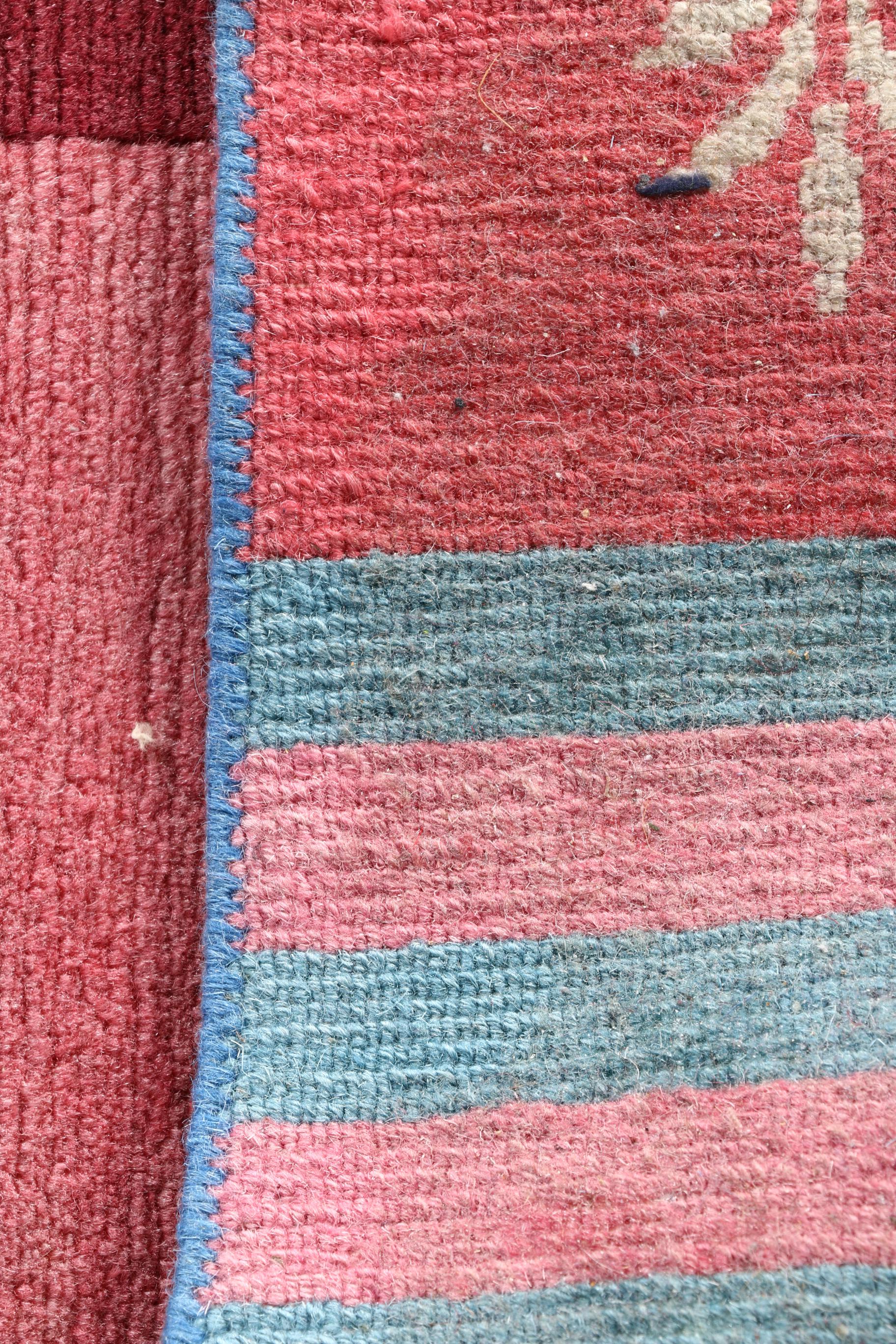 Hand Knotted Tibetan-Style Wool Area Rug