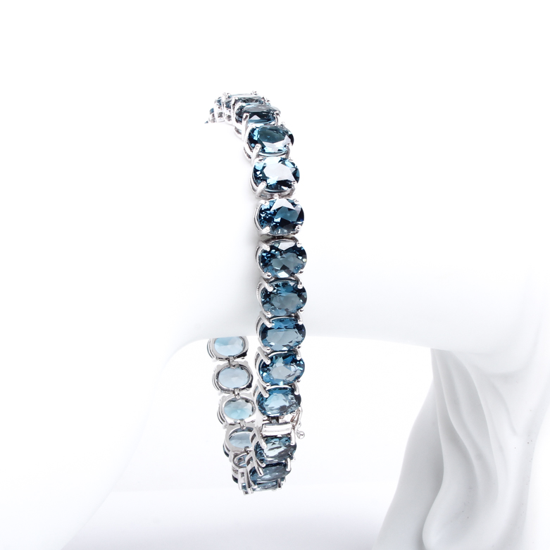 14K White Gold and Blue Topaz Tennis Bracelet