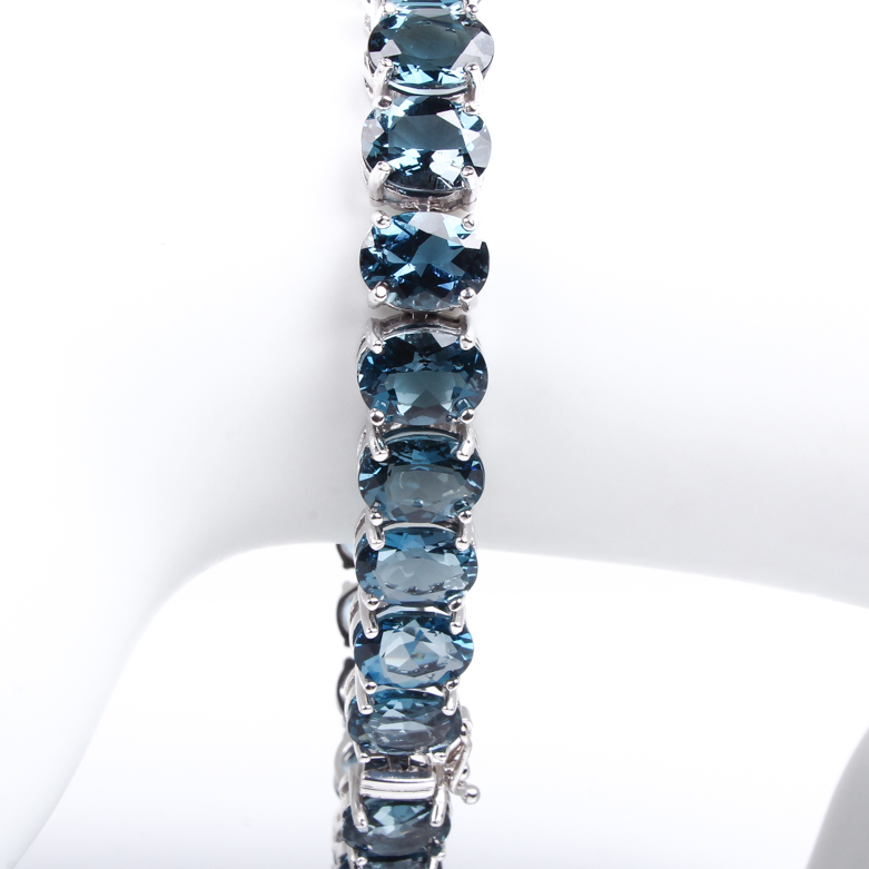 14K White Gold and Blue Topaz Tennis Bracelet