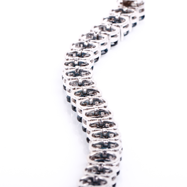 14K White Gold and Blue Topaz Tennis Bracelet