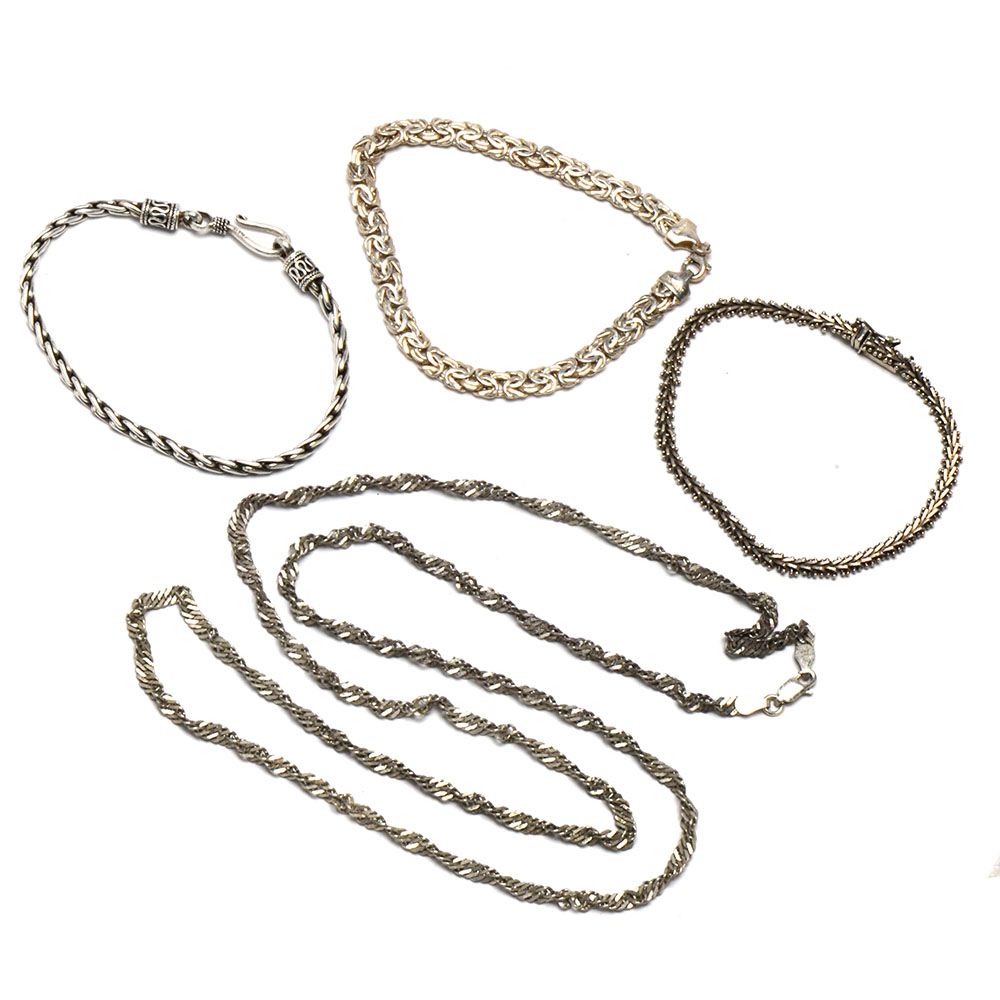 Three Sterling Silver Linked Bracelets and Necklace