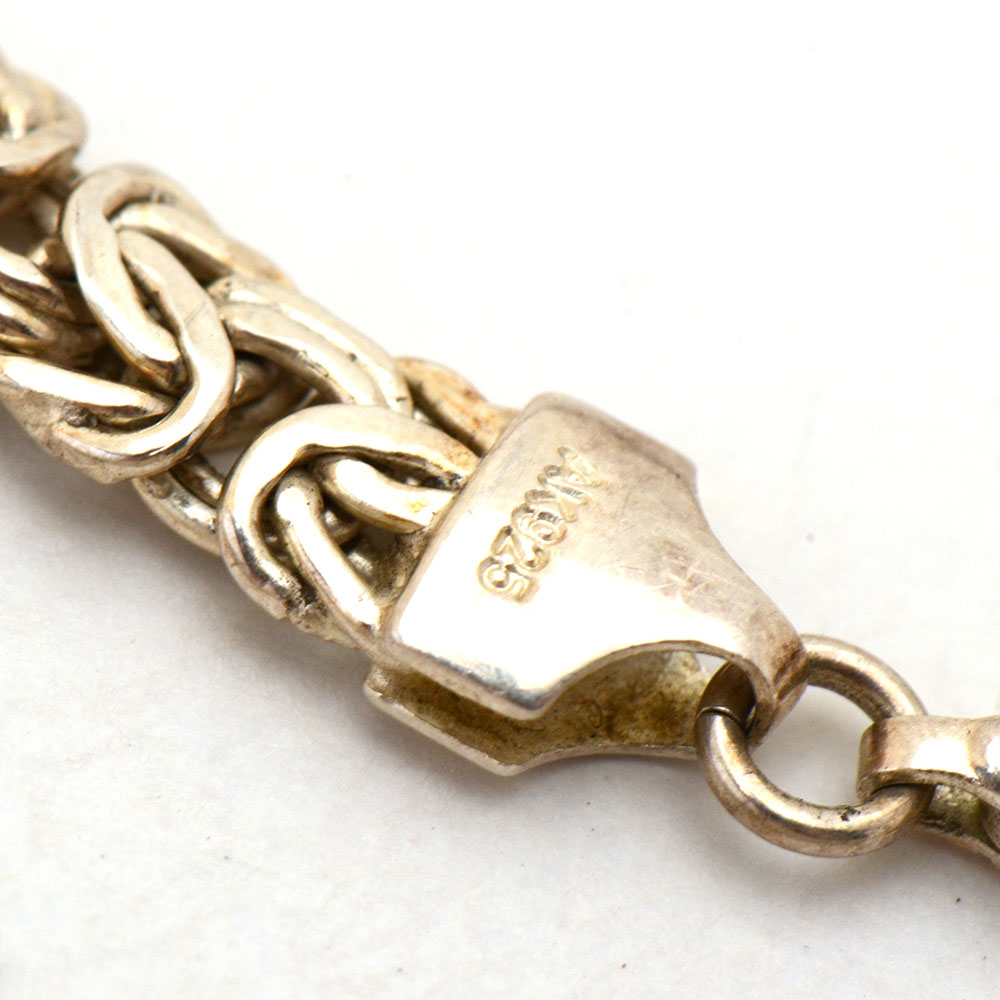 Three Sterling Silver Linked Bracelets and Necklace