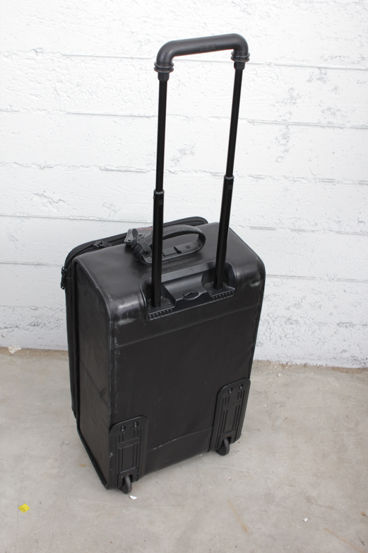 Tumi Leather Suitcase