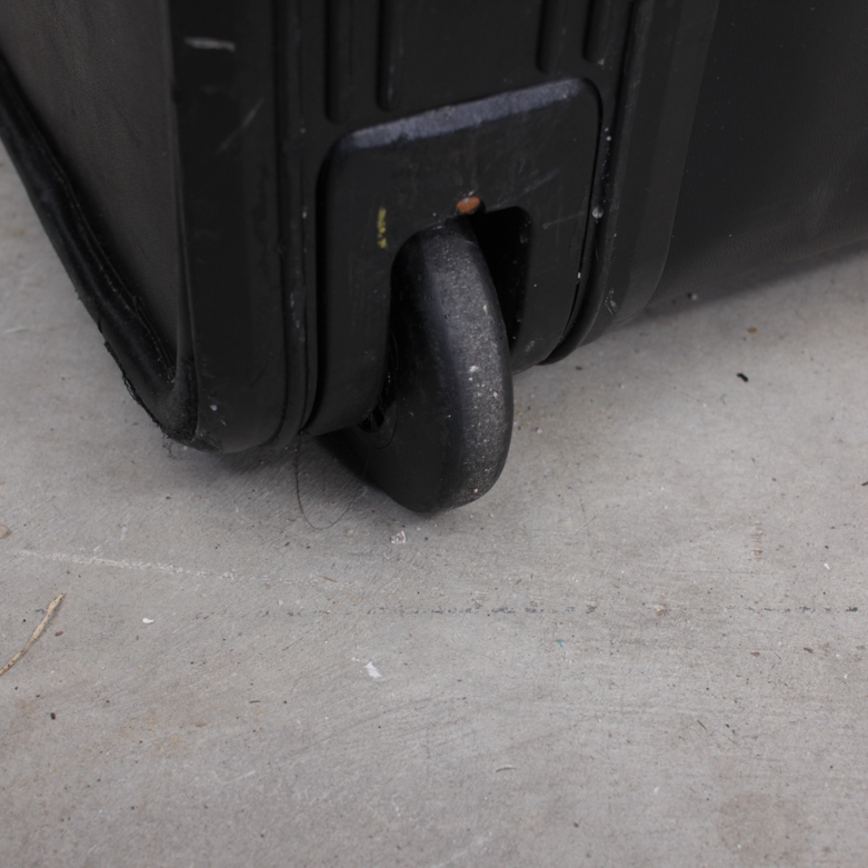 Tumi Leather Suitcase