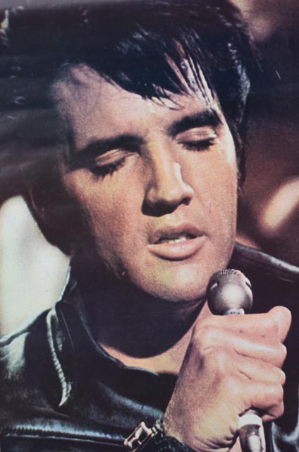 Four Posters Depicting Rock and Roll Legends