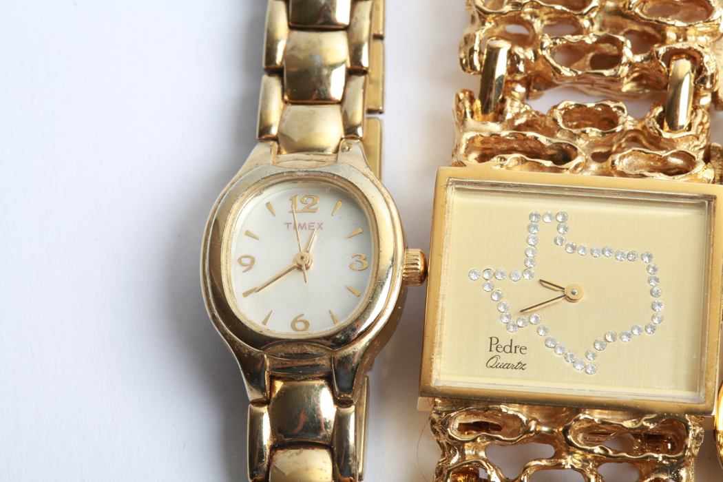 Three Gold Tone Watches