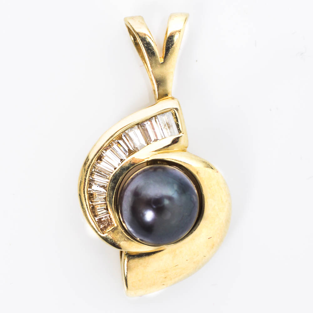14k Gold Pendant with Black Pearl and Diamonds.