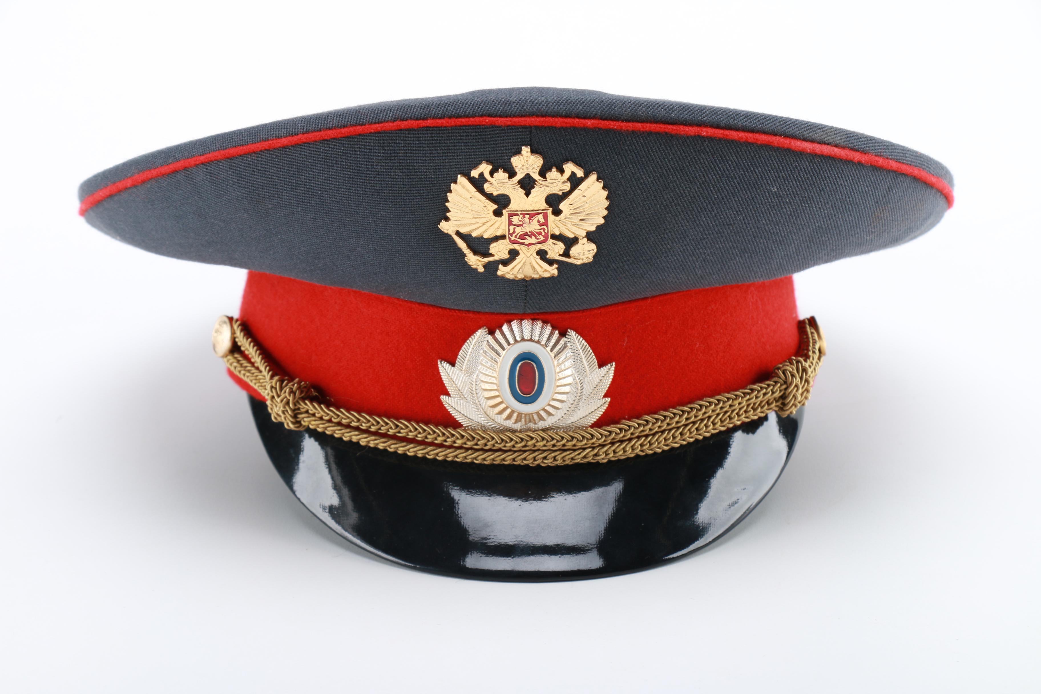 East German Officer and Russian Police Hats
