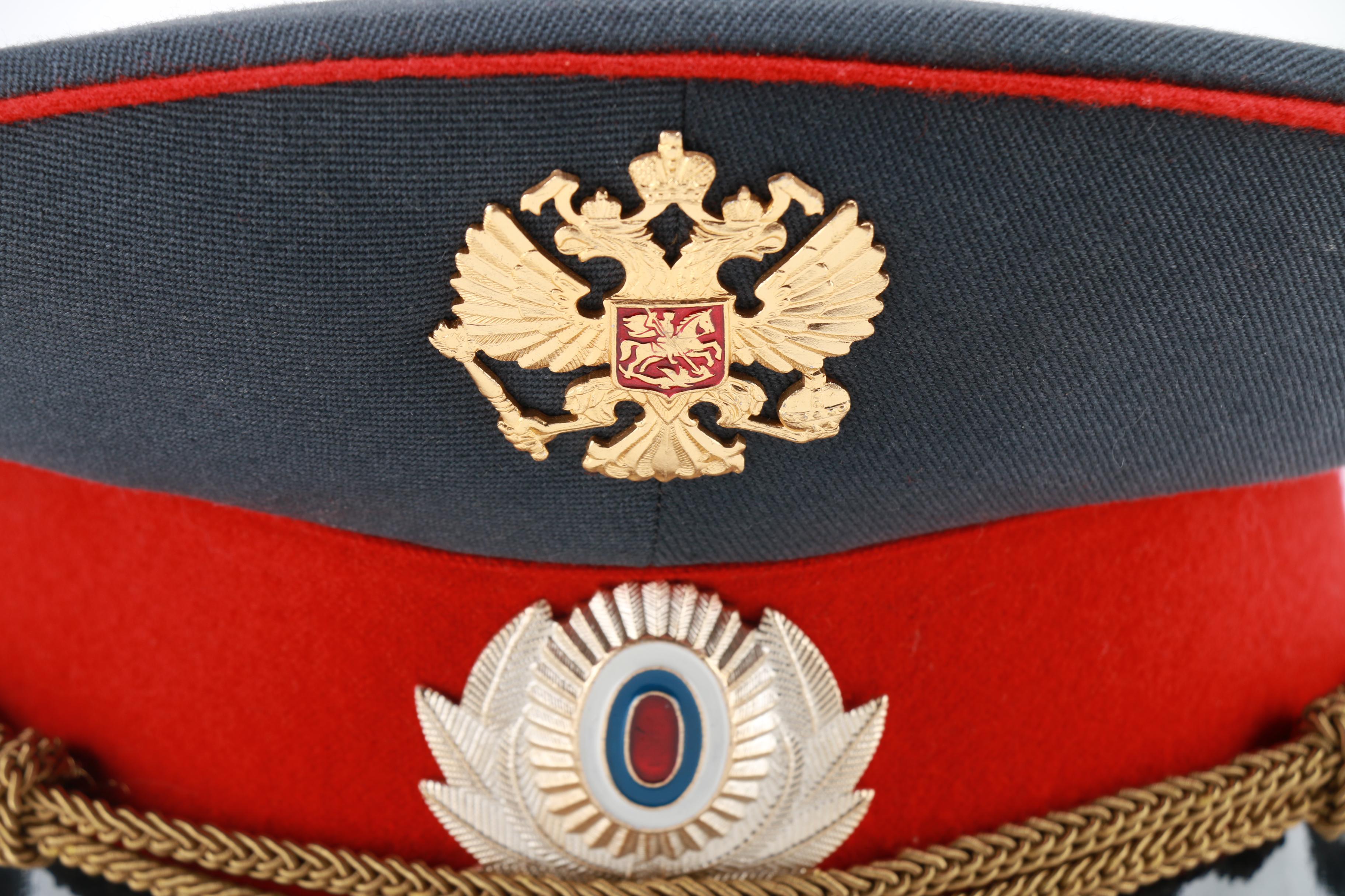 East German Officer and Russian Police Hats