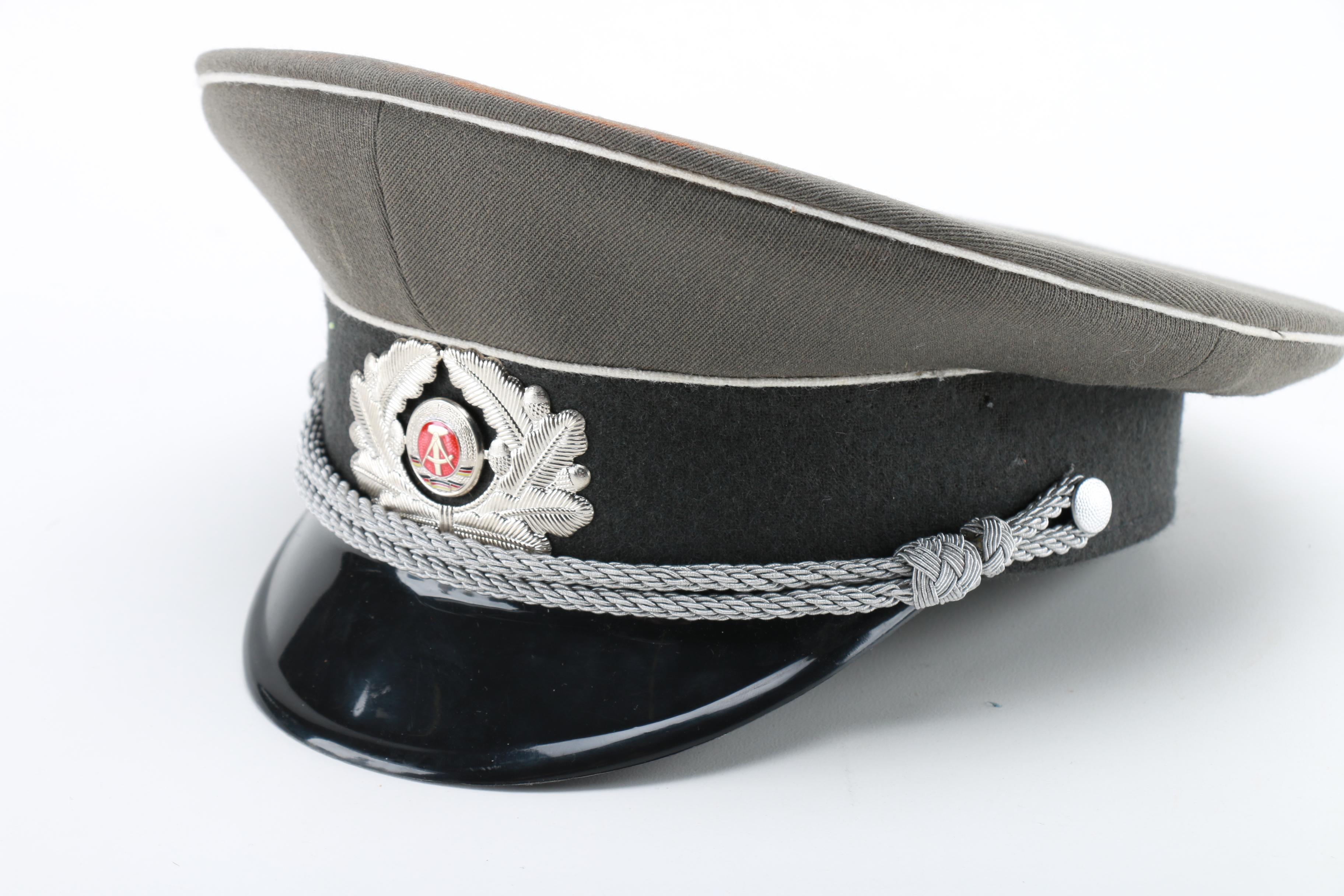 East German Officer and Russian Police Hats