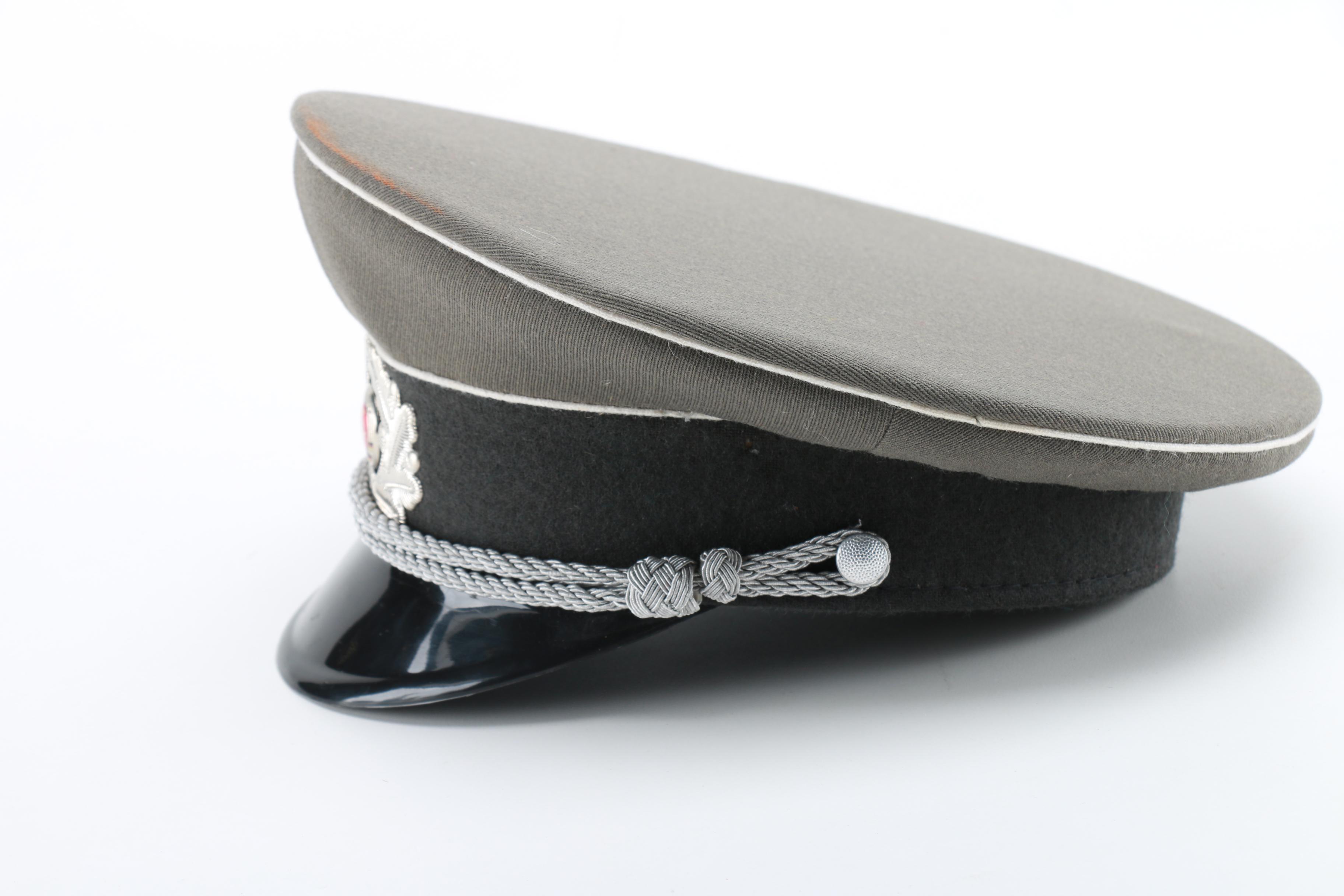 East German Officer and Russian Police Hats
