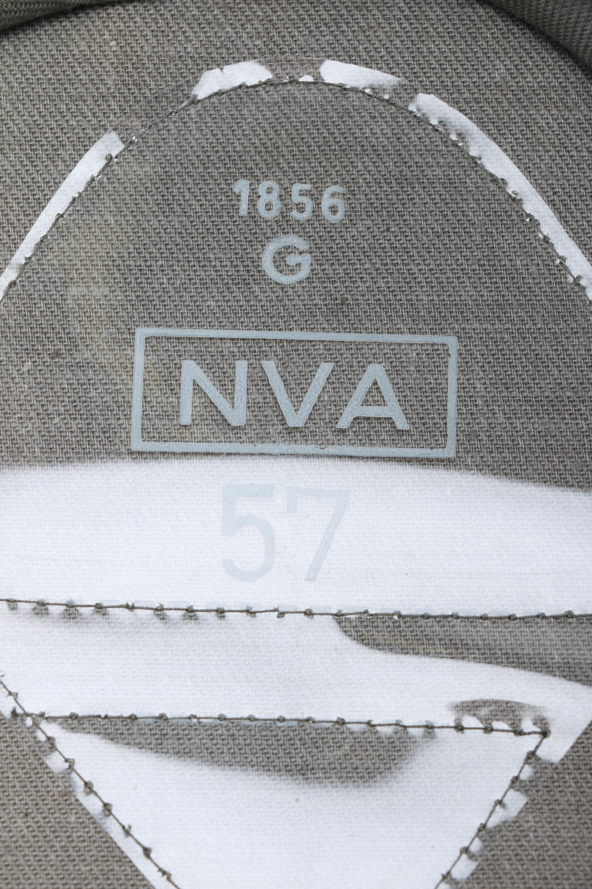 East German Officer and Russian Police Hats