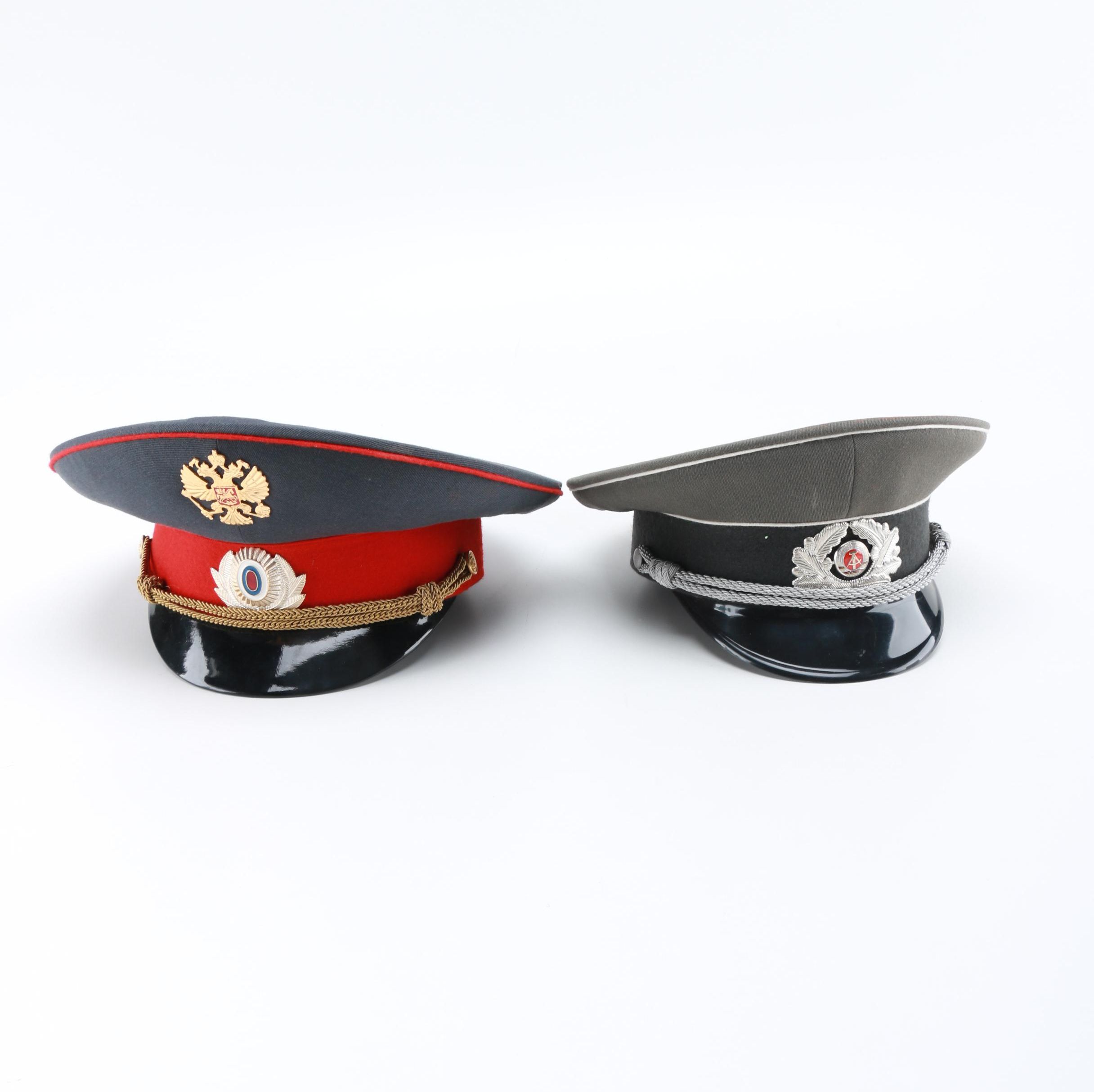 East German Officer and Russian Police Hats