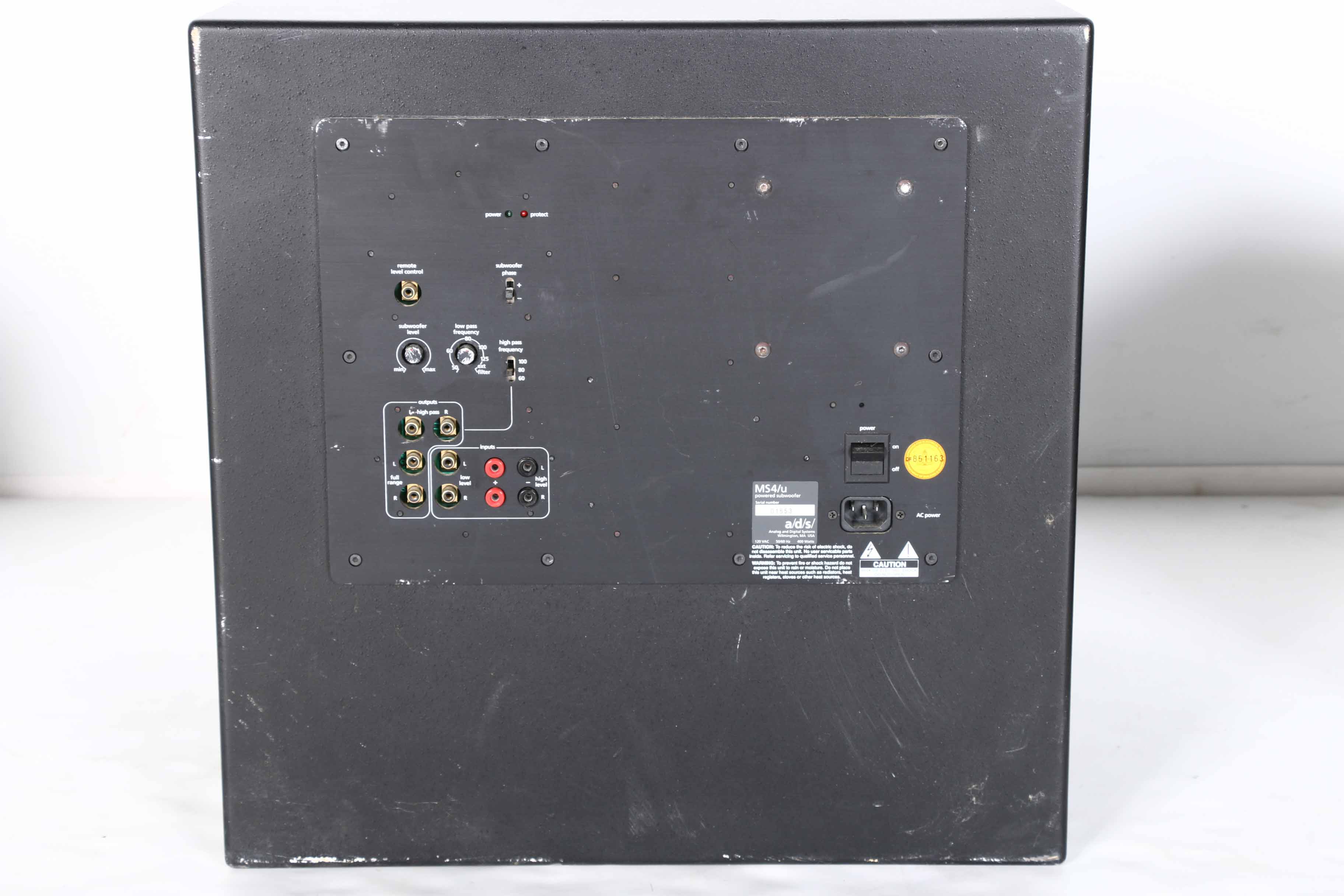 Black ADS Powered Subwoofer and Design Acoustics Speakers