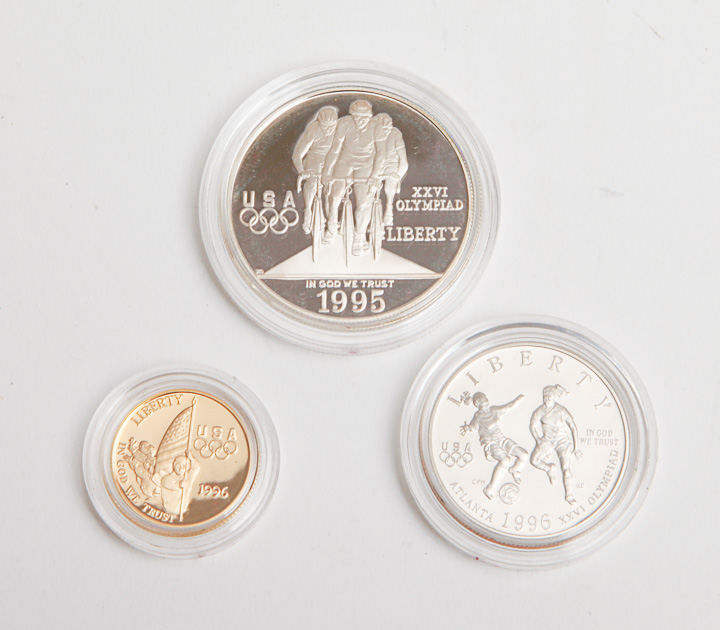 Three 1995 XXVI Olympiad Four-Coin Proof Sets