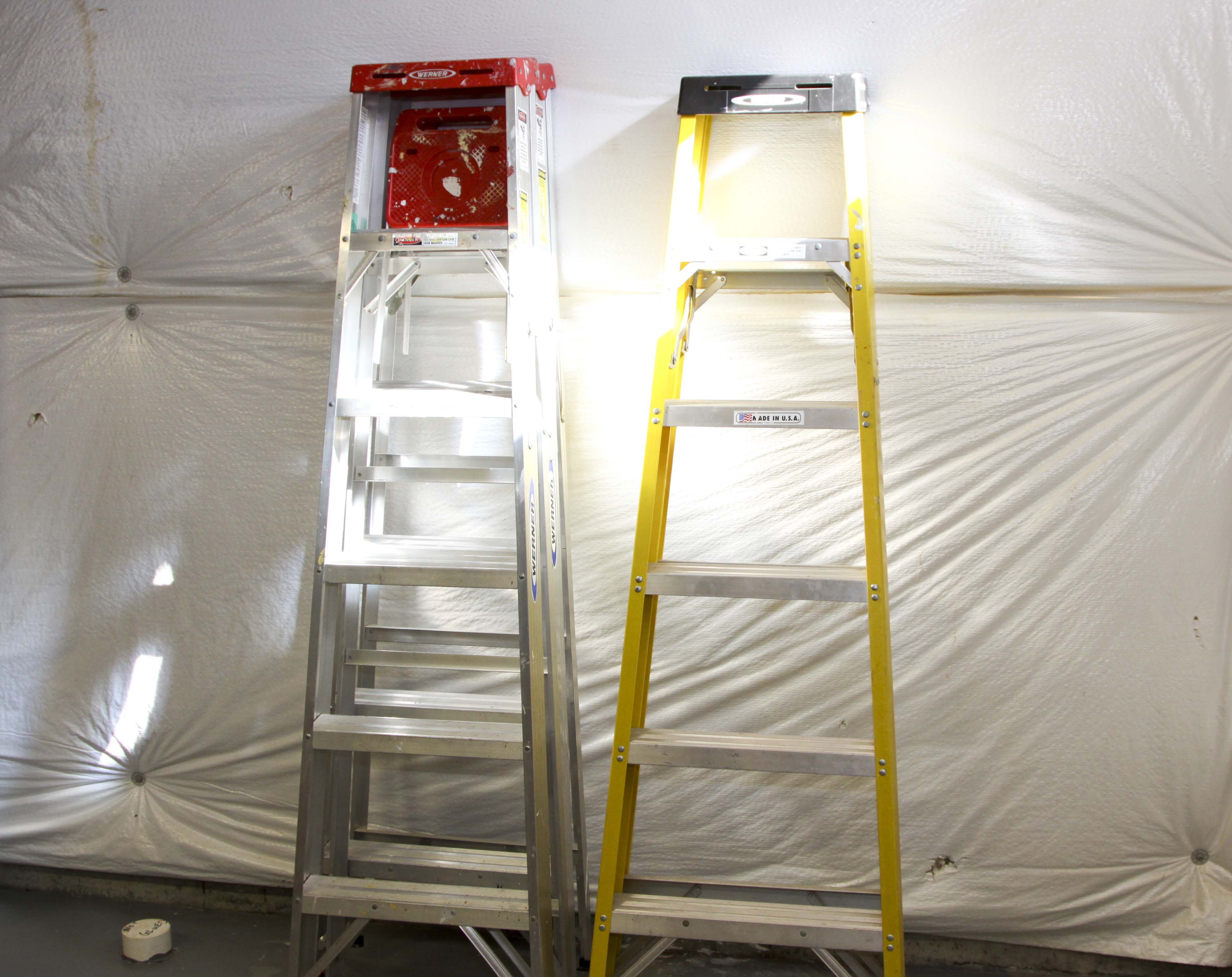 Group of Metal Ladders