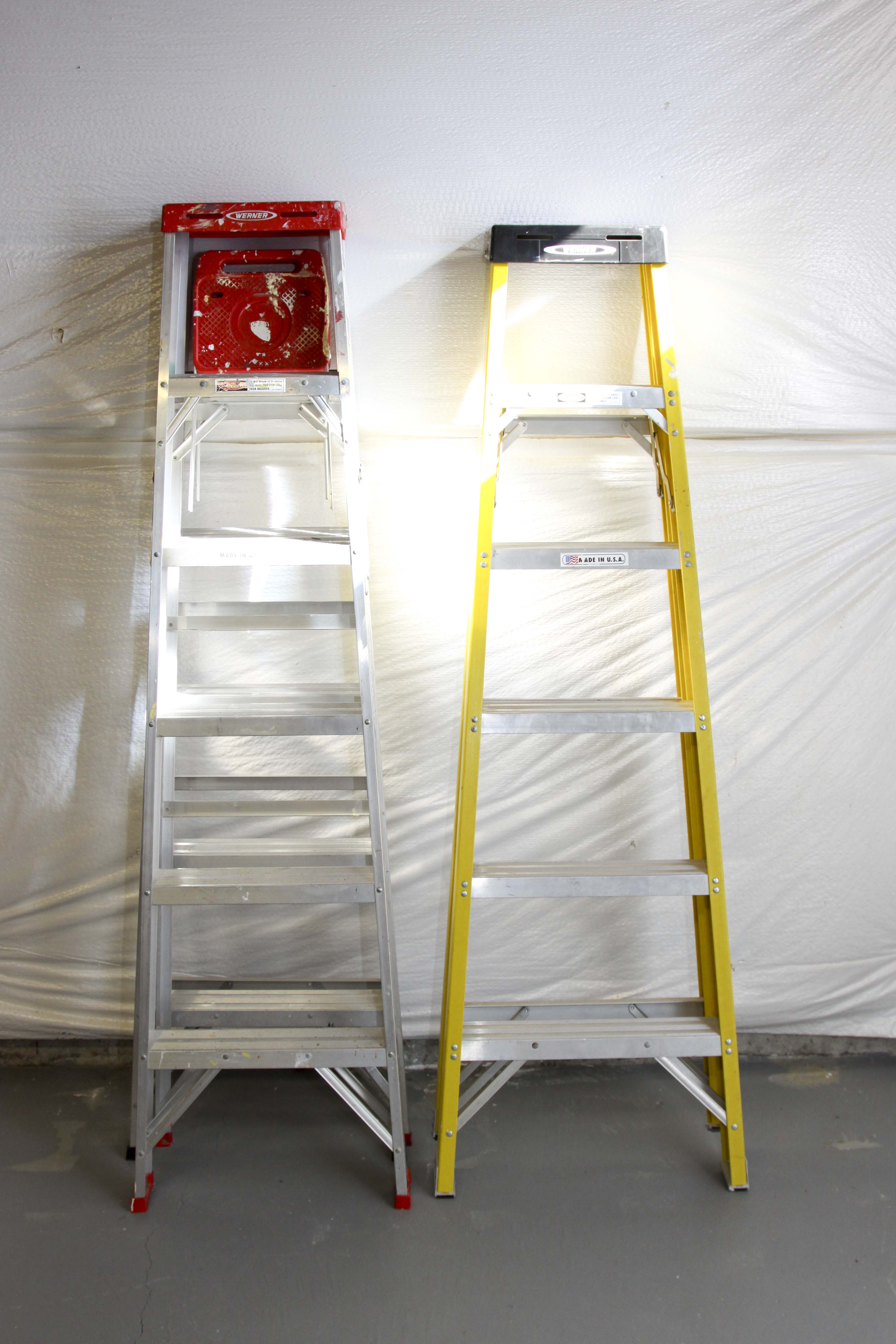 Group of Metal Ladders