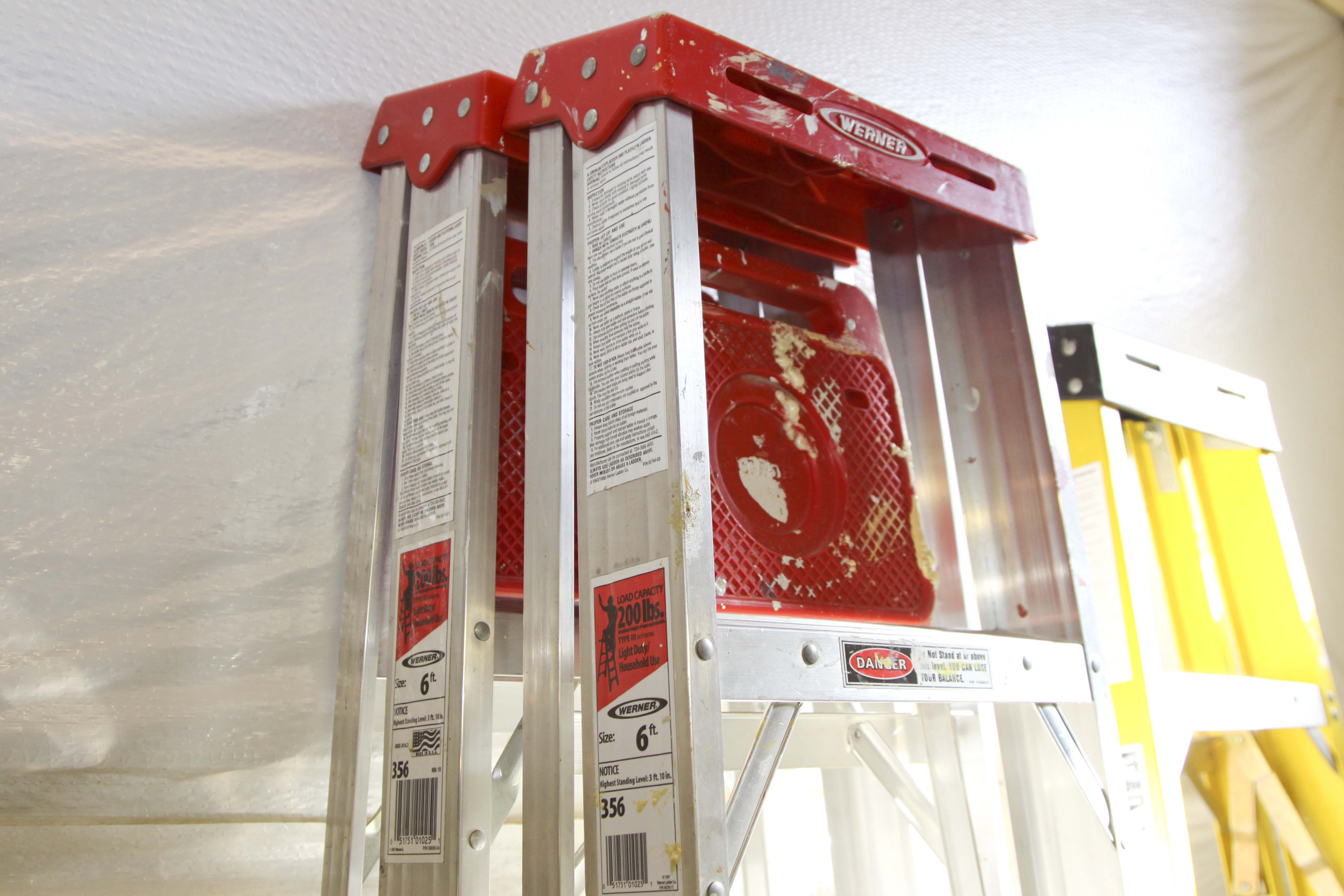 Group of Metal Ladders