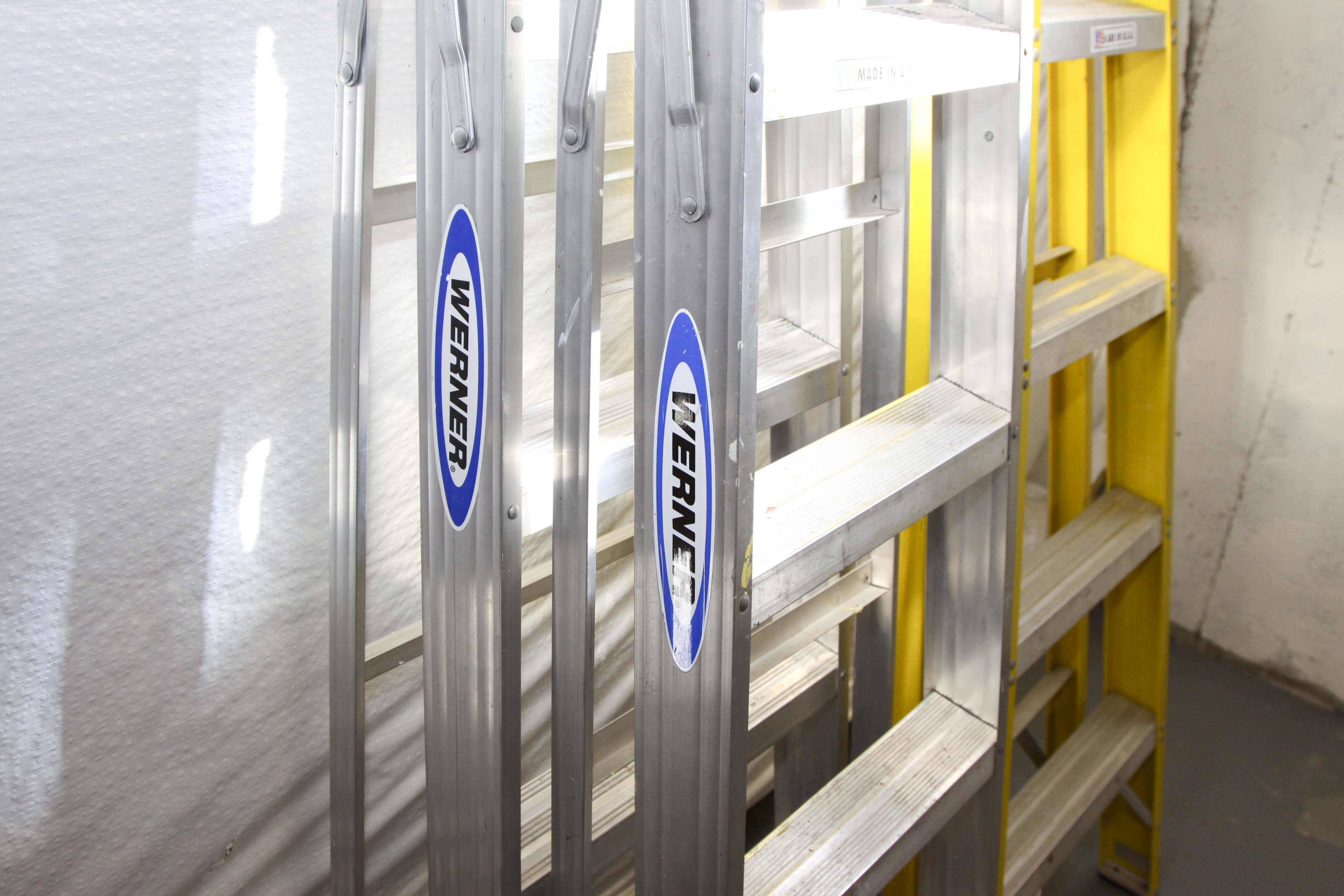 Group of Metal Ladders