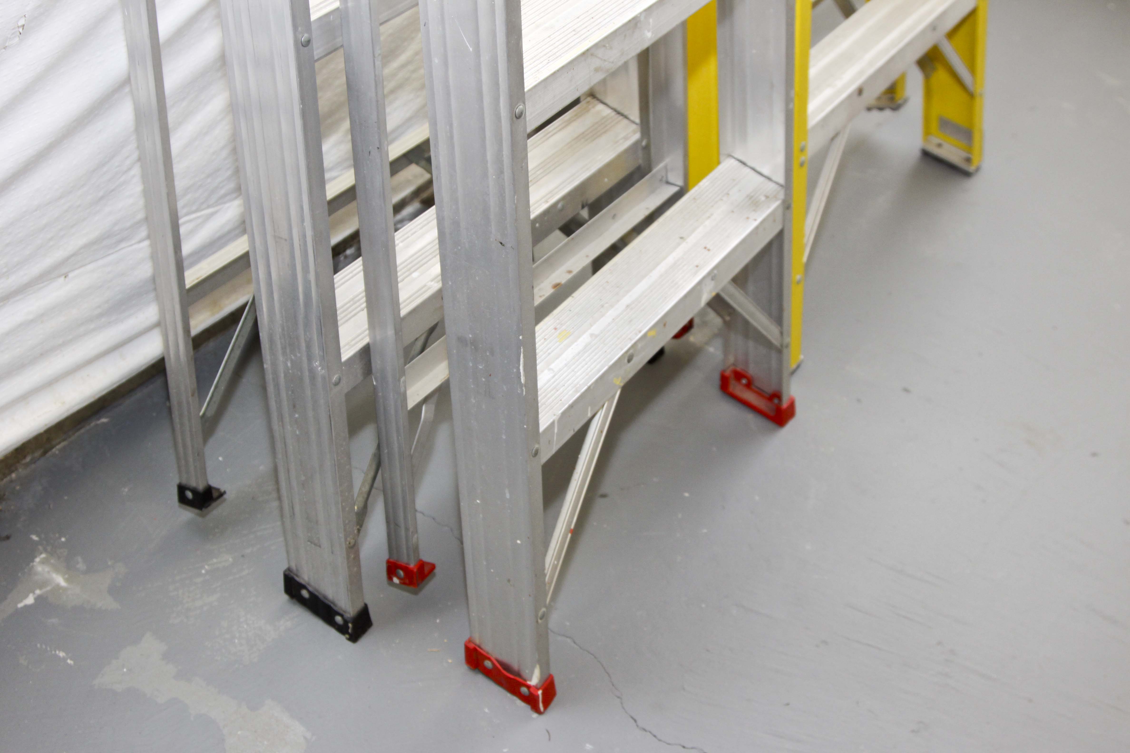 Group of Metal Ladders