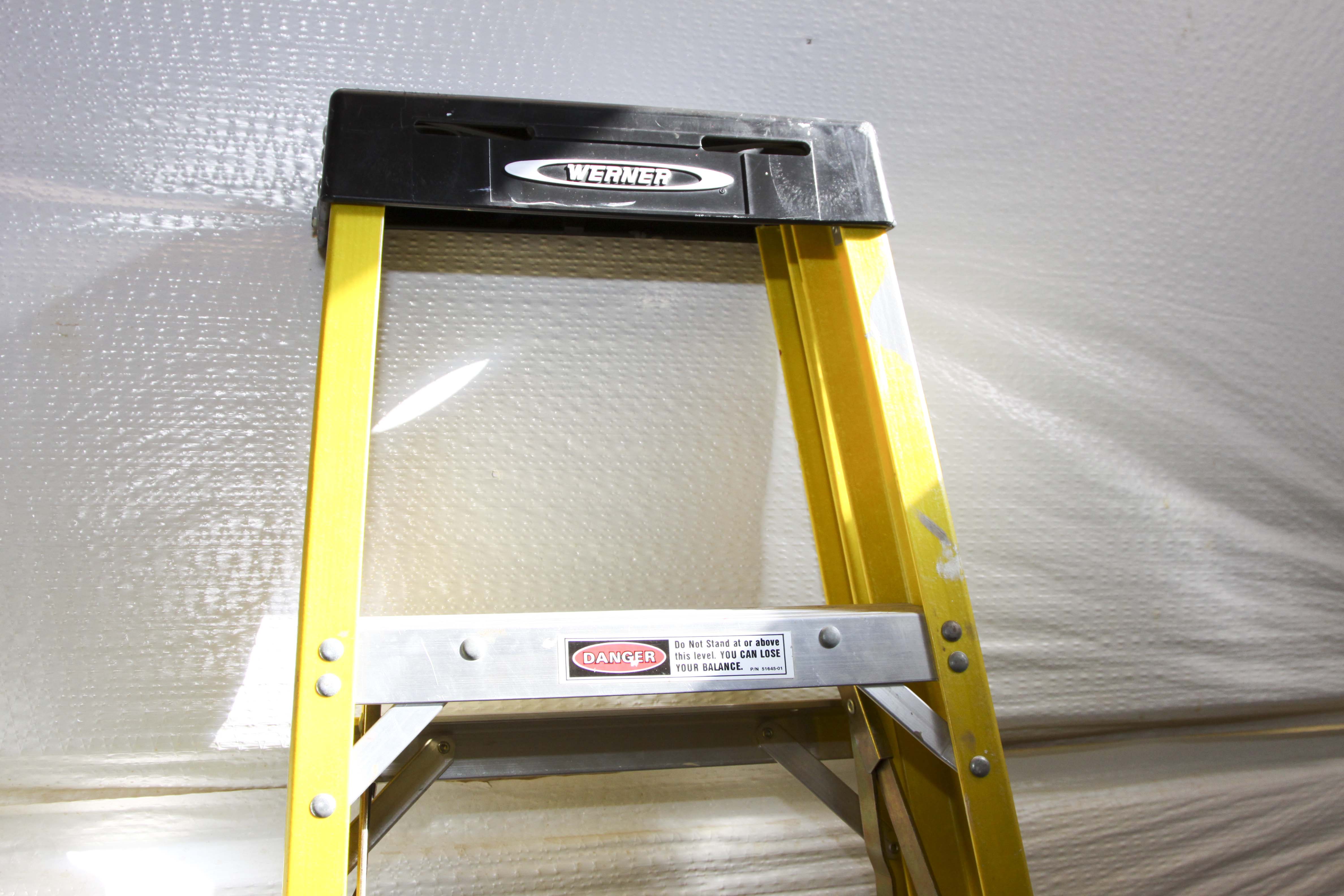 Group of Metal Ladders