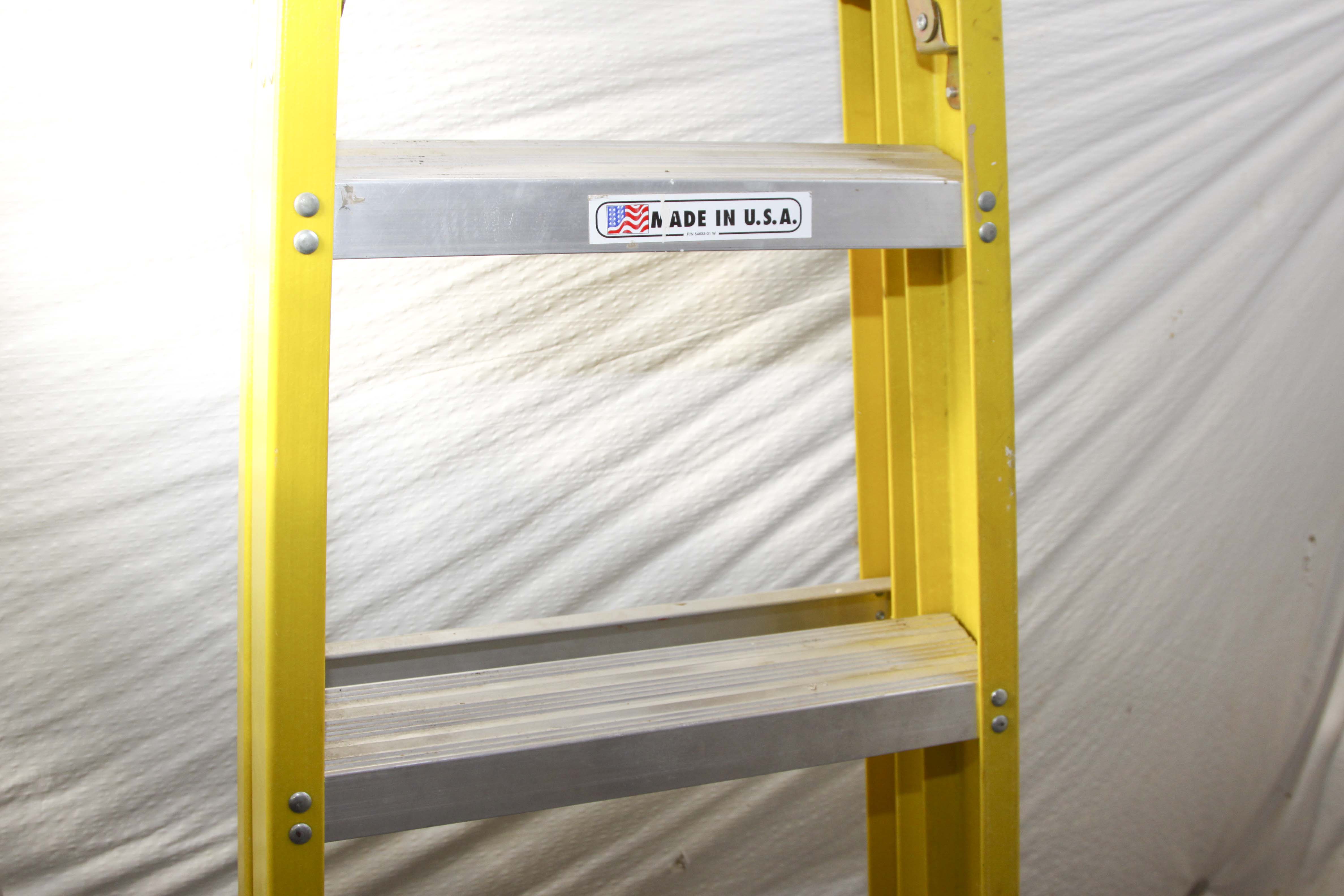 Group of Metal Ladders