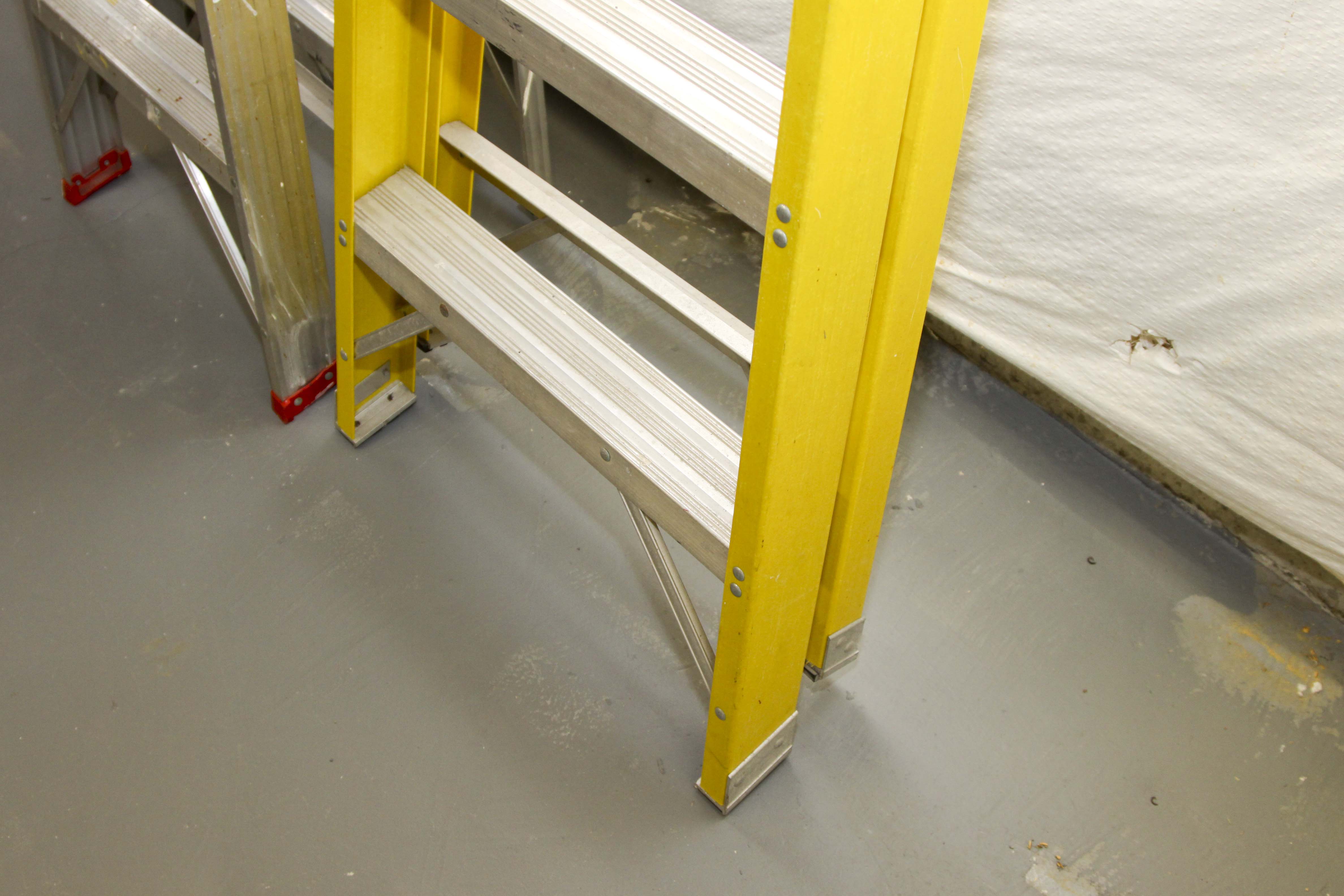 Group of Metal Ladders