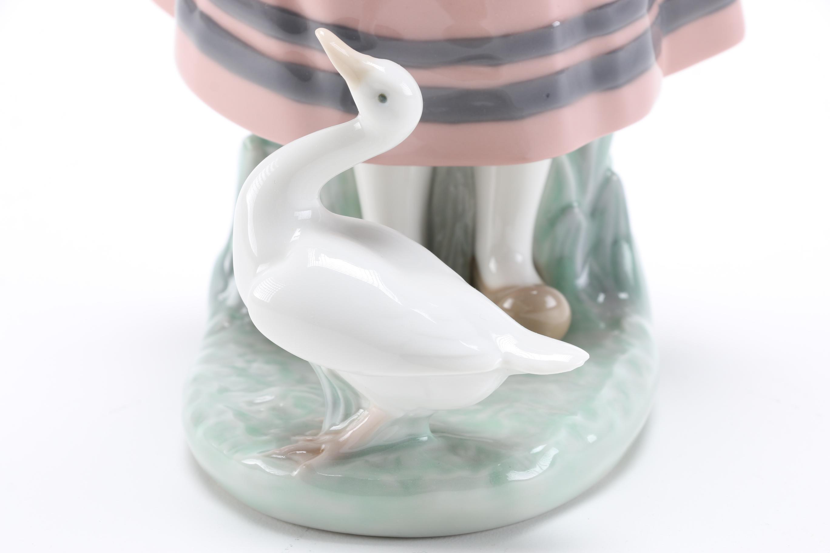 Lladró "Josefa Feeding Duck" Figurine