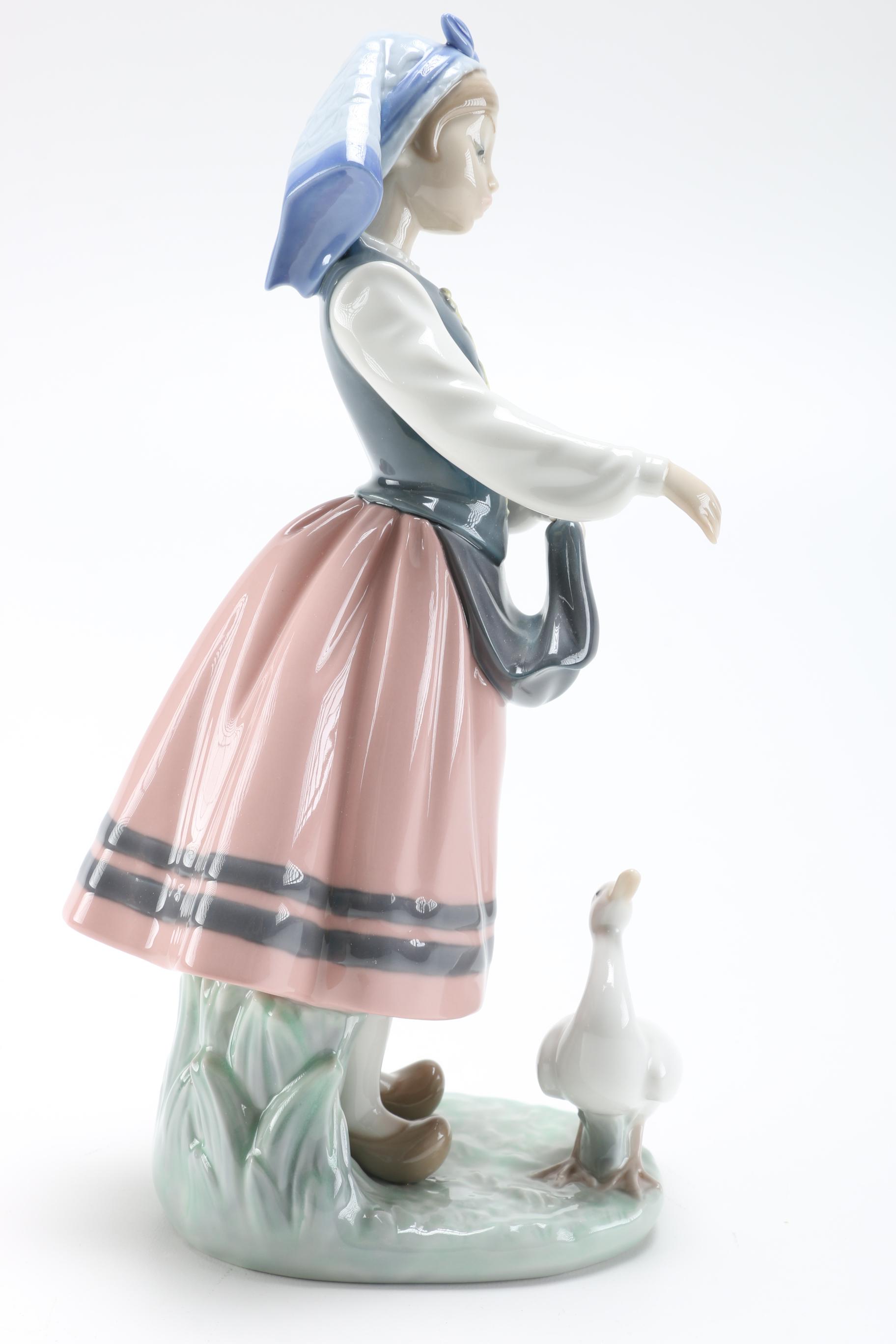 Lladró "Josefa Feeding Duck" Figurine