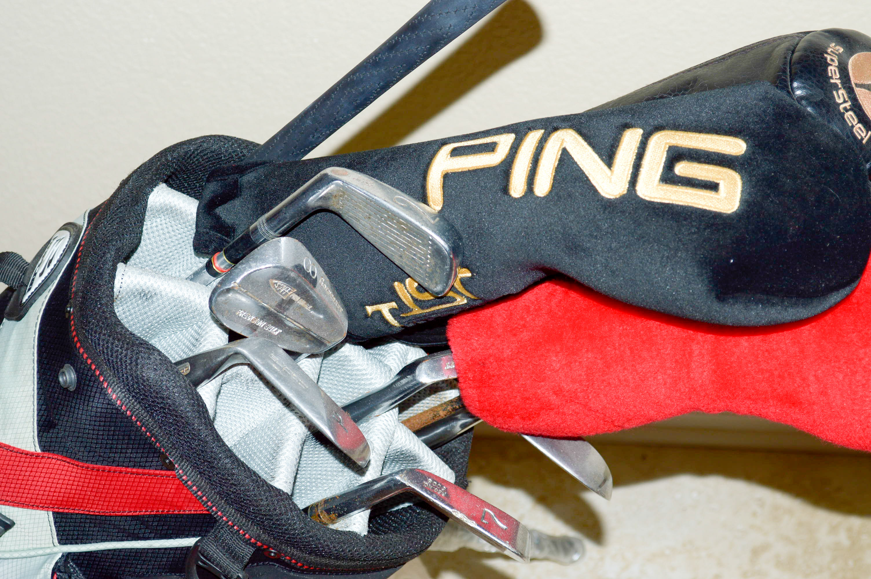 Assorted Golf Clubs with Coors Light Golf Bag