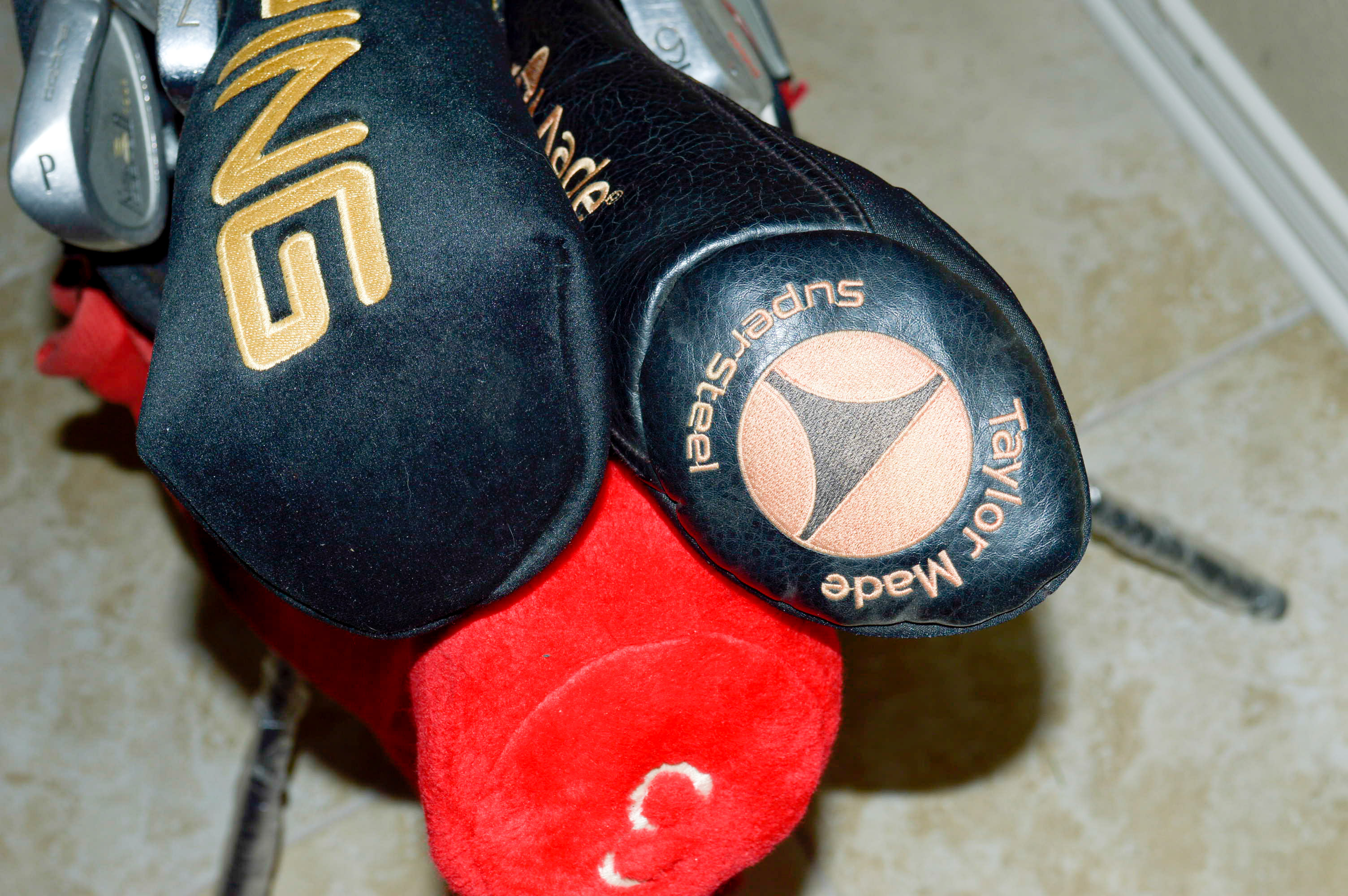 Assorted Golf Clubs with Coors Light Golf Bag