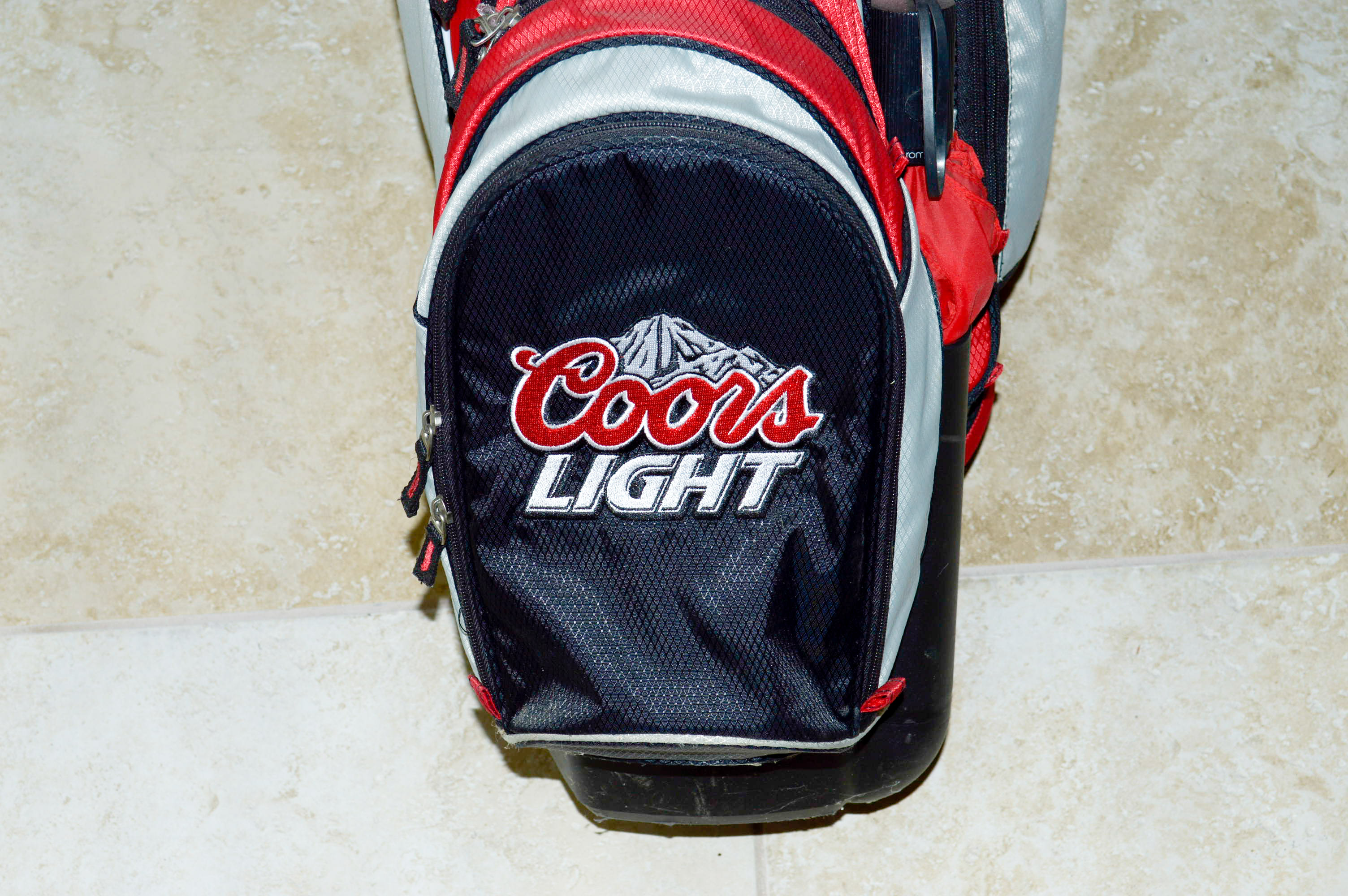 Assorted Golf Clubs with Coors Light Golf Bag