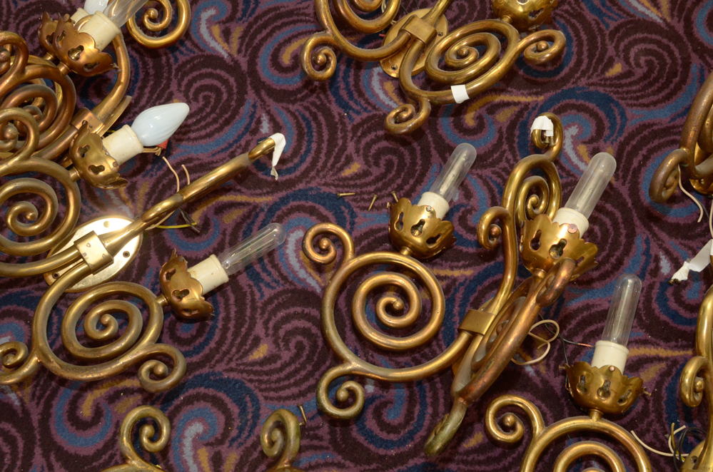 Eight Scroll-Arm Wall Sconces with Ceramic Shades