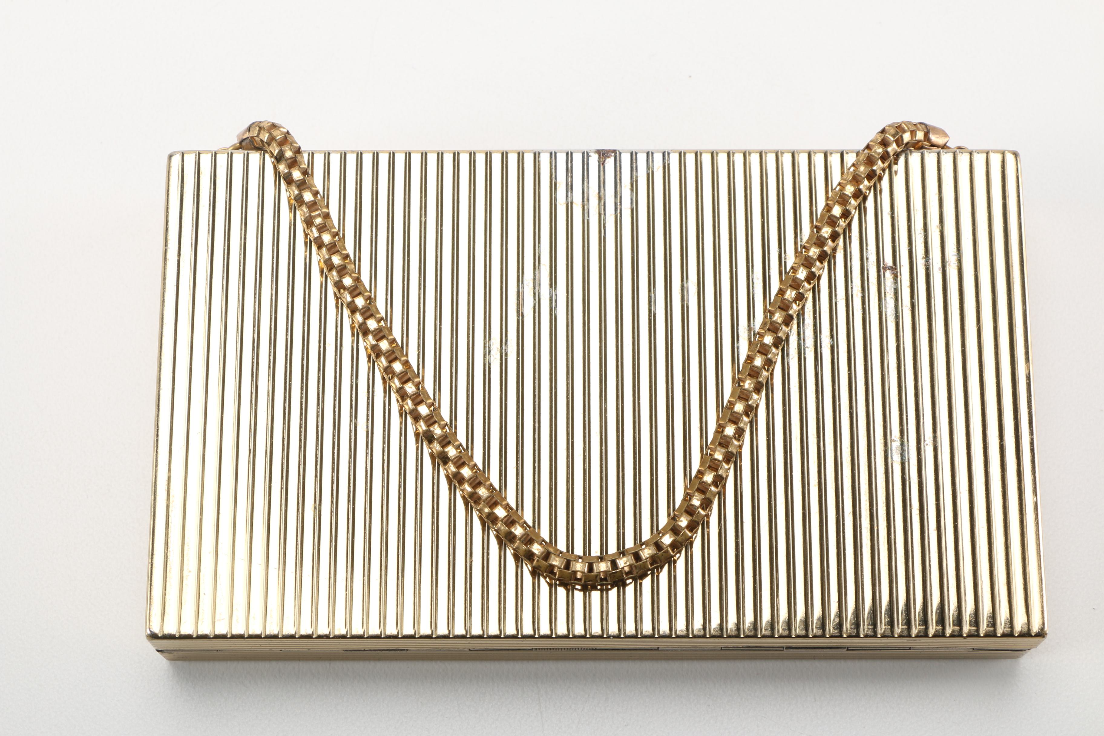 Three Gold Tone and Silver Tone Compacts