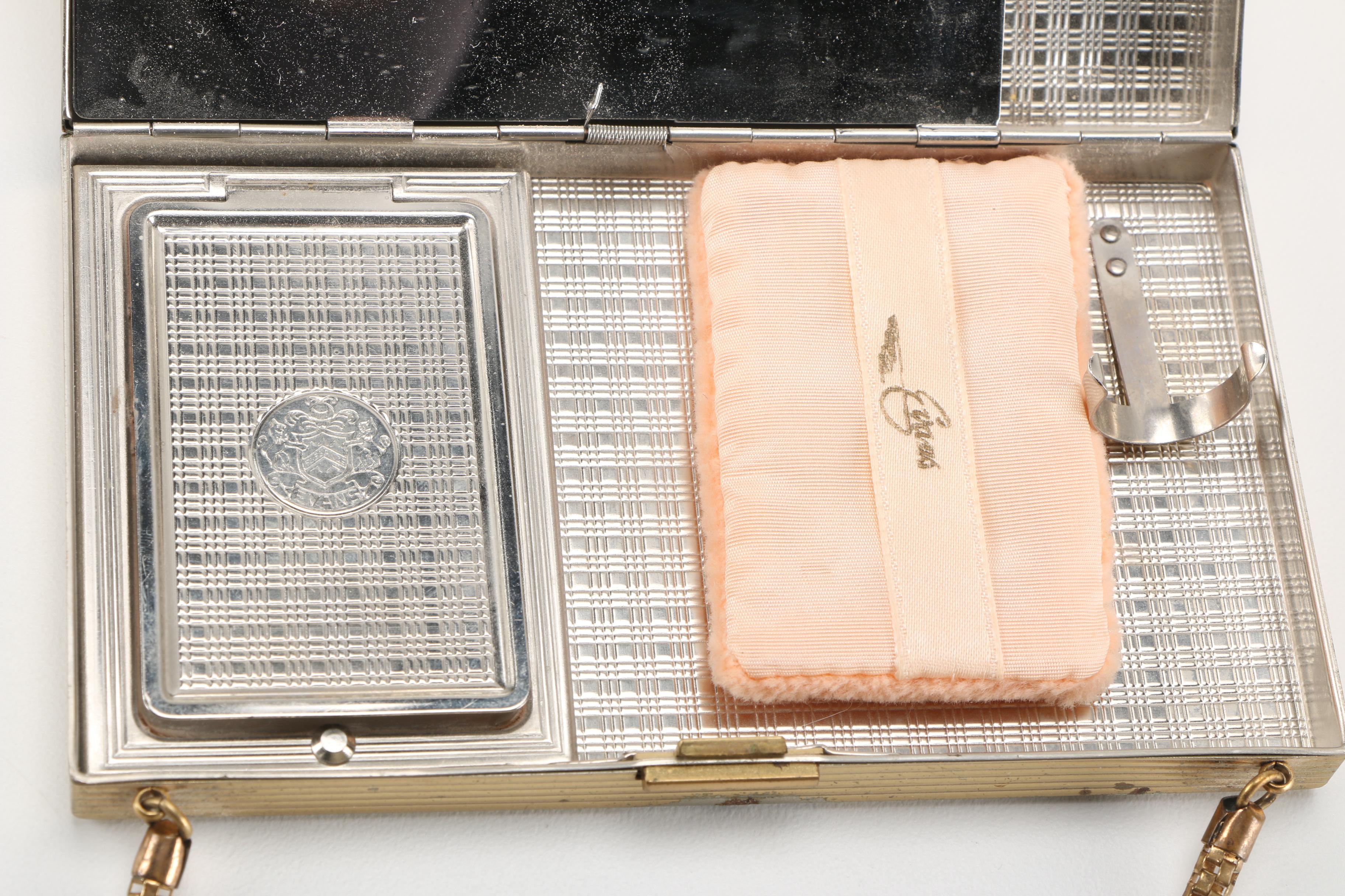 Three Gold Tone and Silver Tone Compacts