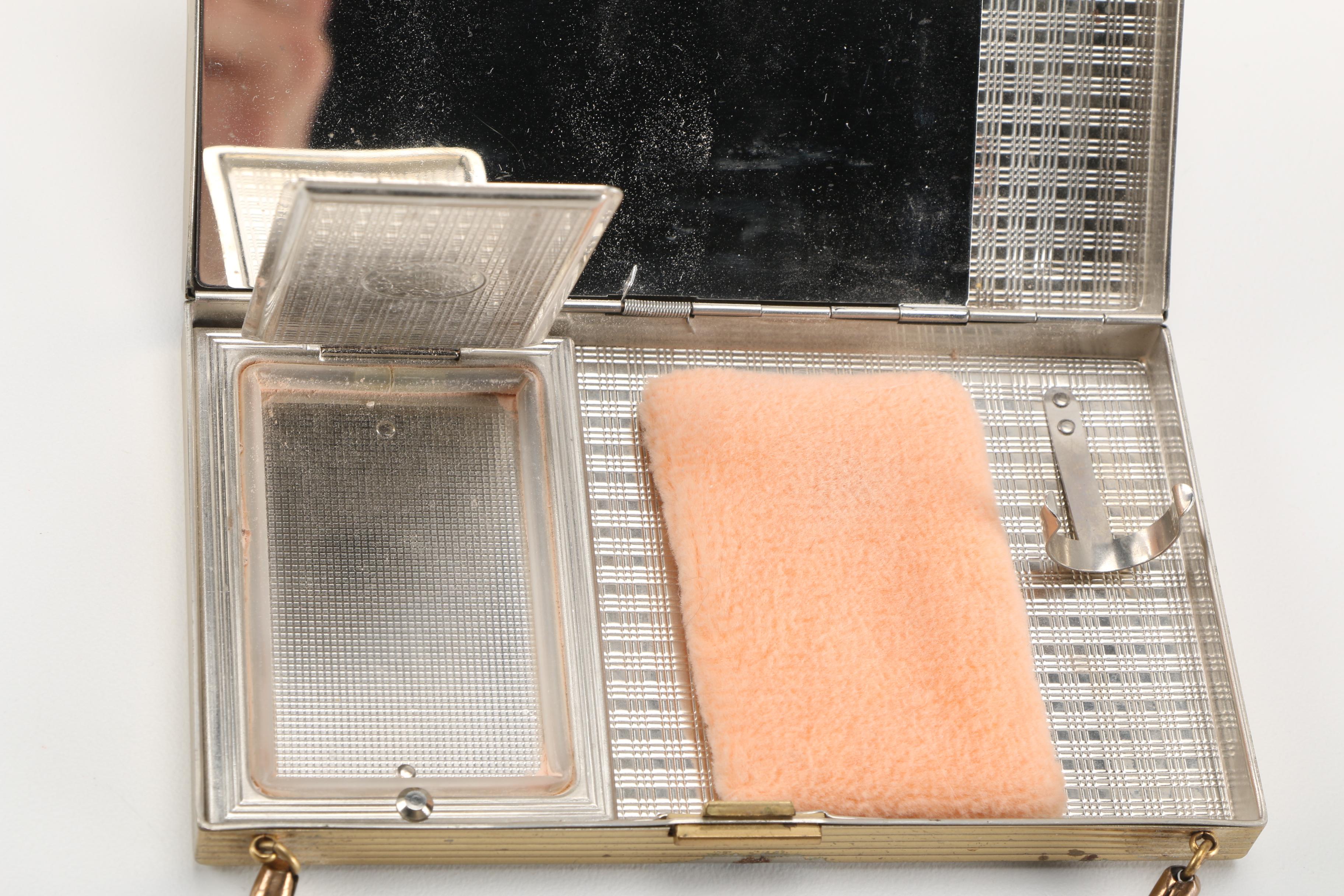 Three Gold Tone and Silver Tone Compacts