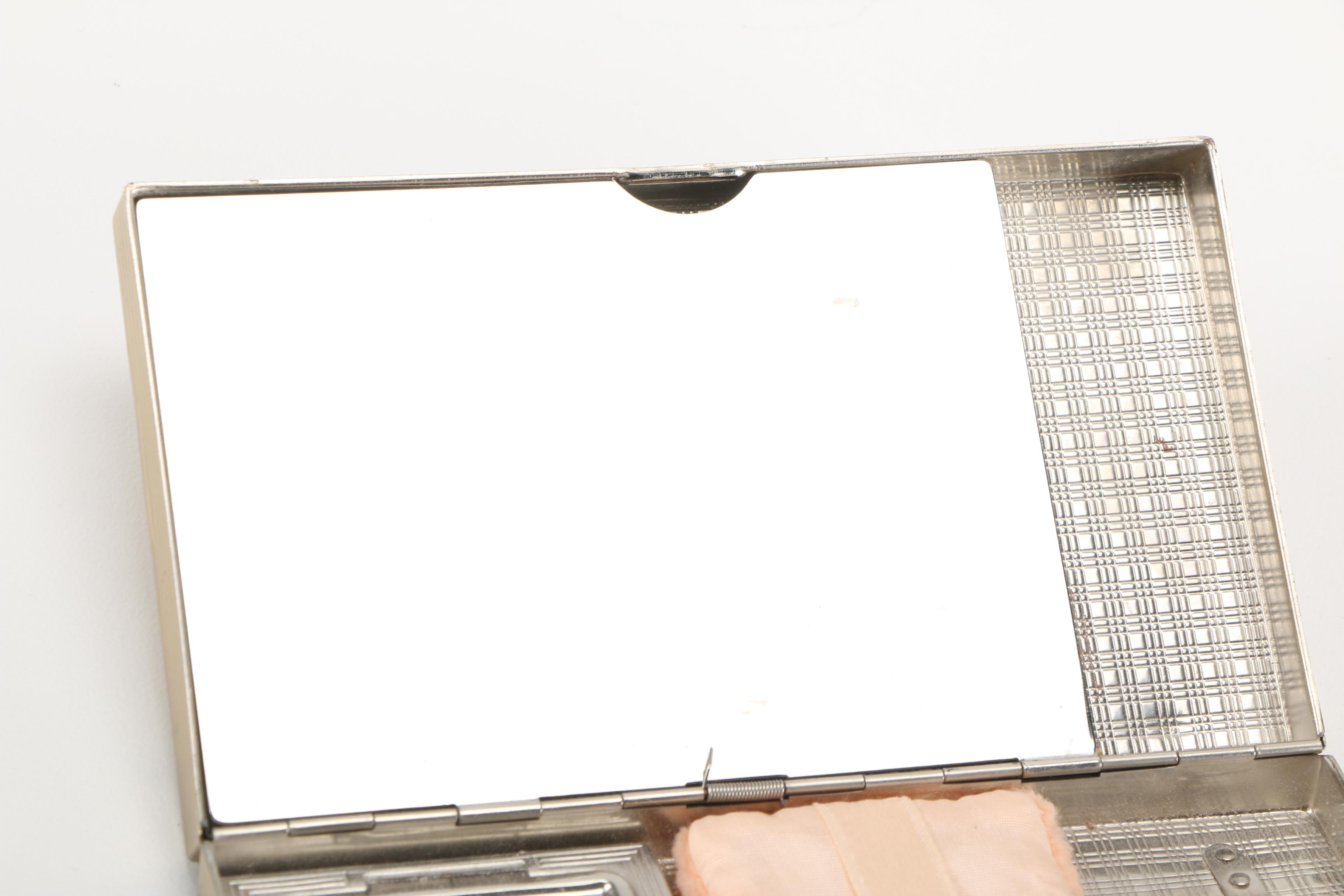 Three Gold Tone and Silver Tone Compacts