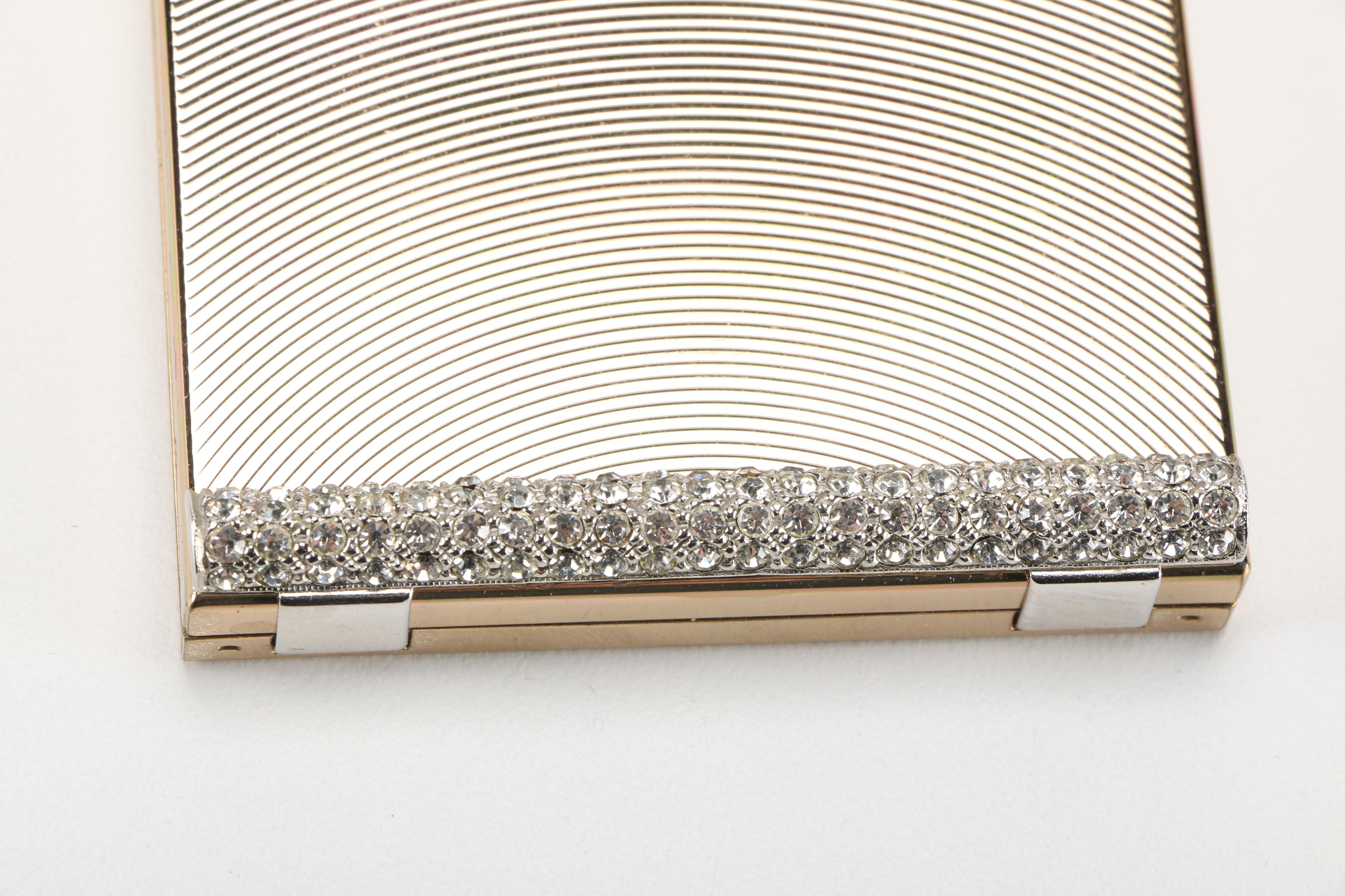 Three Gold Tone and Silver Tone Compacts