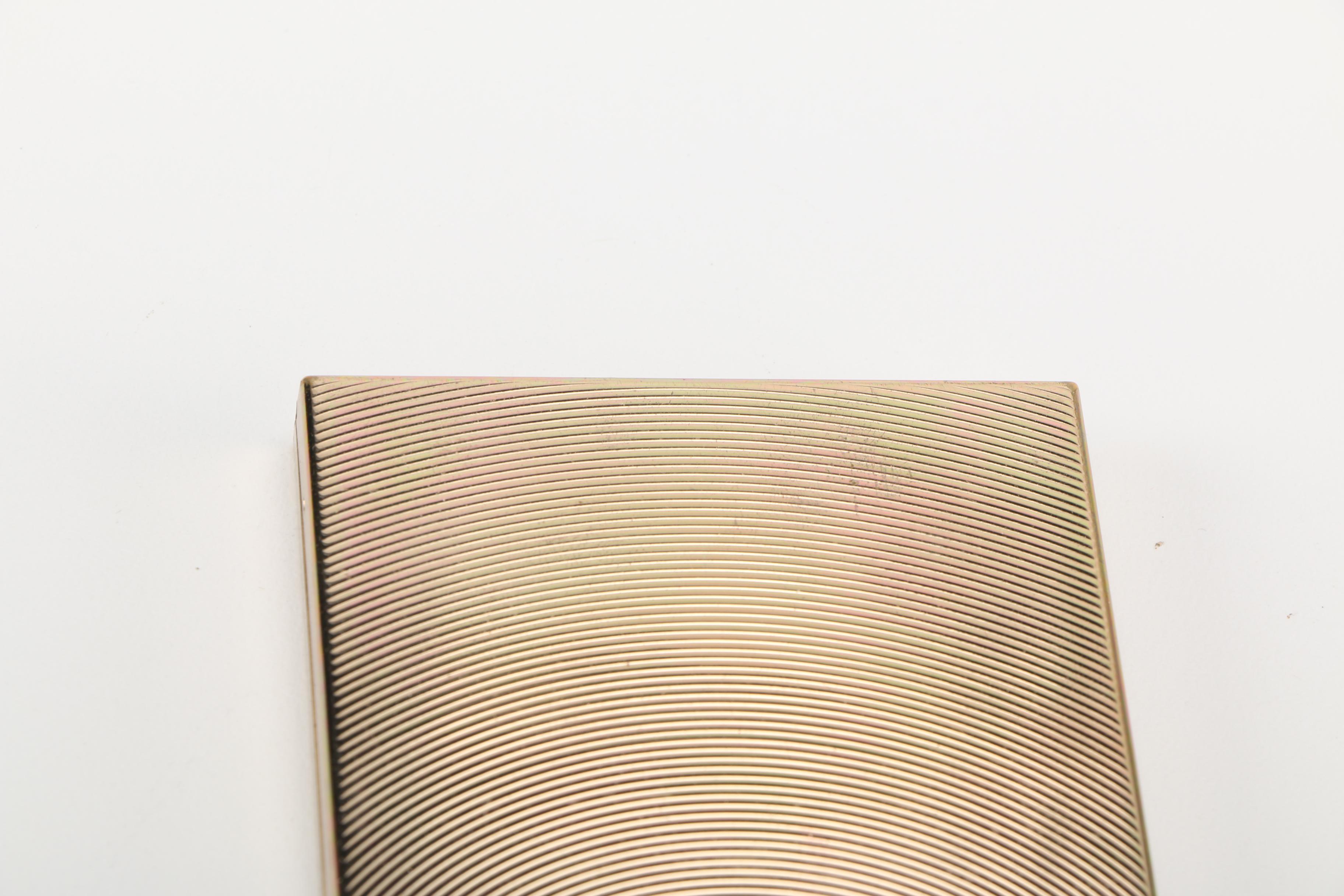 Three Gold Tone and Silver Tone Compacts