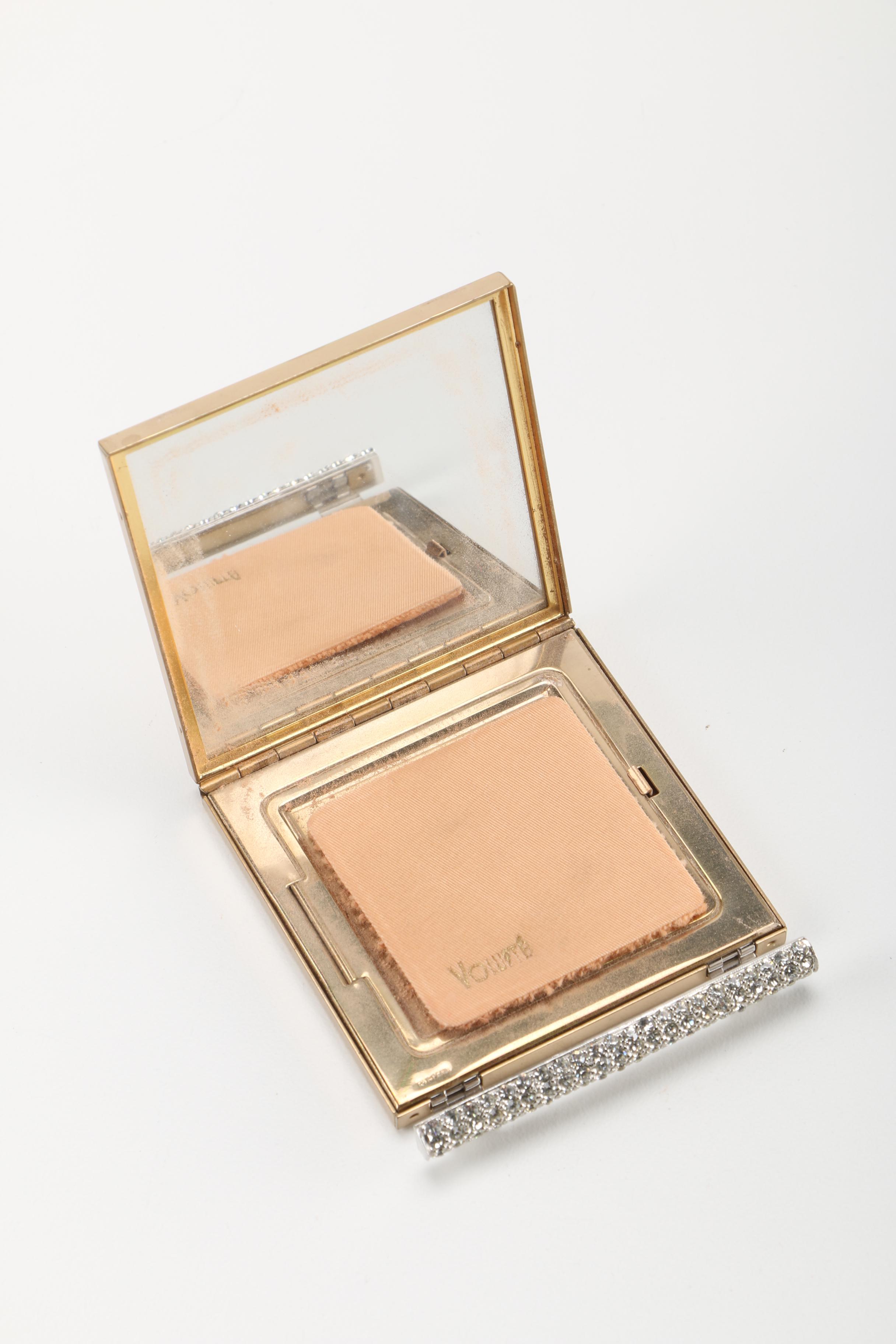 Three Gold Tone and Silver Tone Compacts