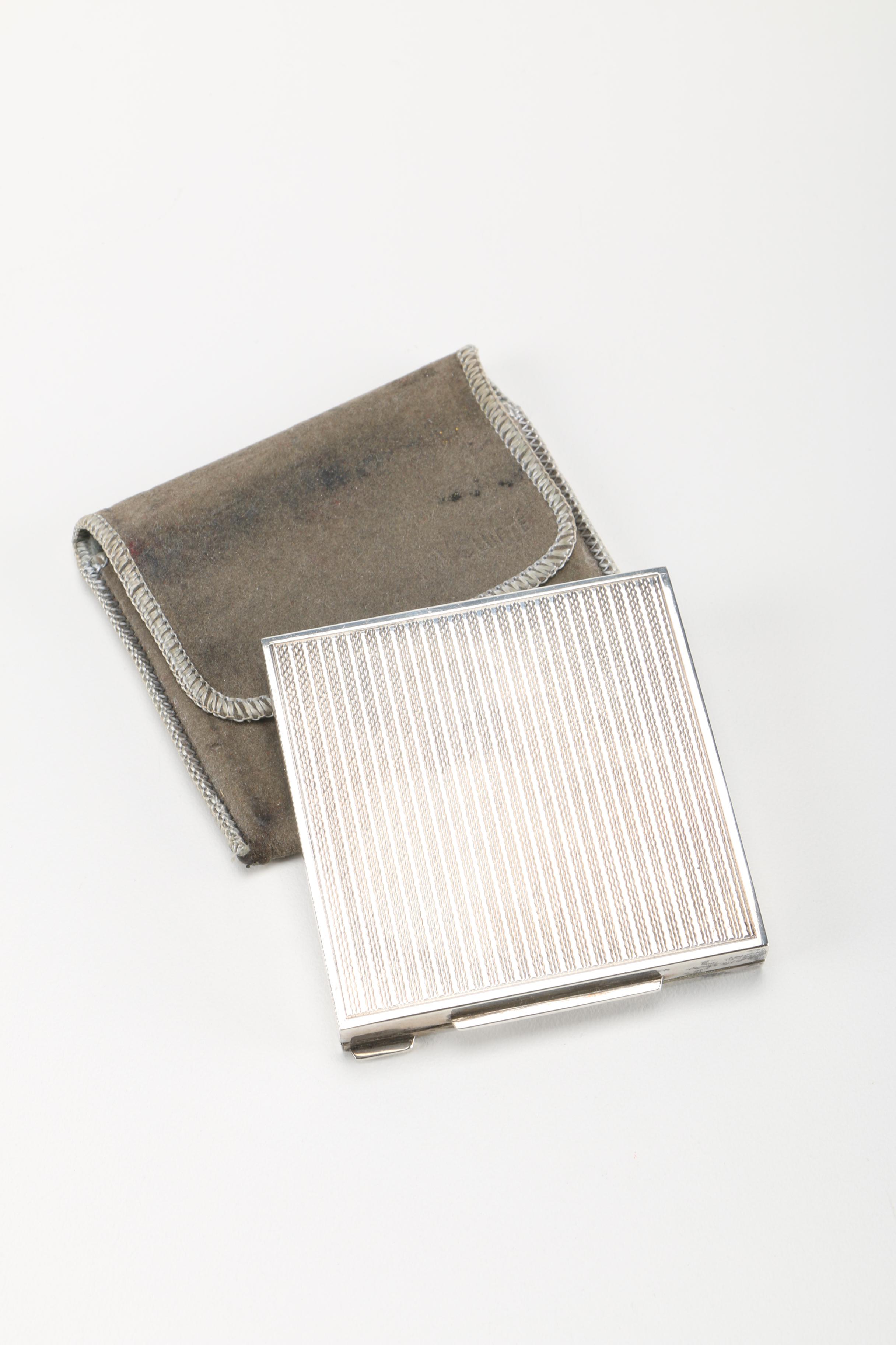 Three Gold Tone and Silver Tone Compacts