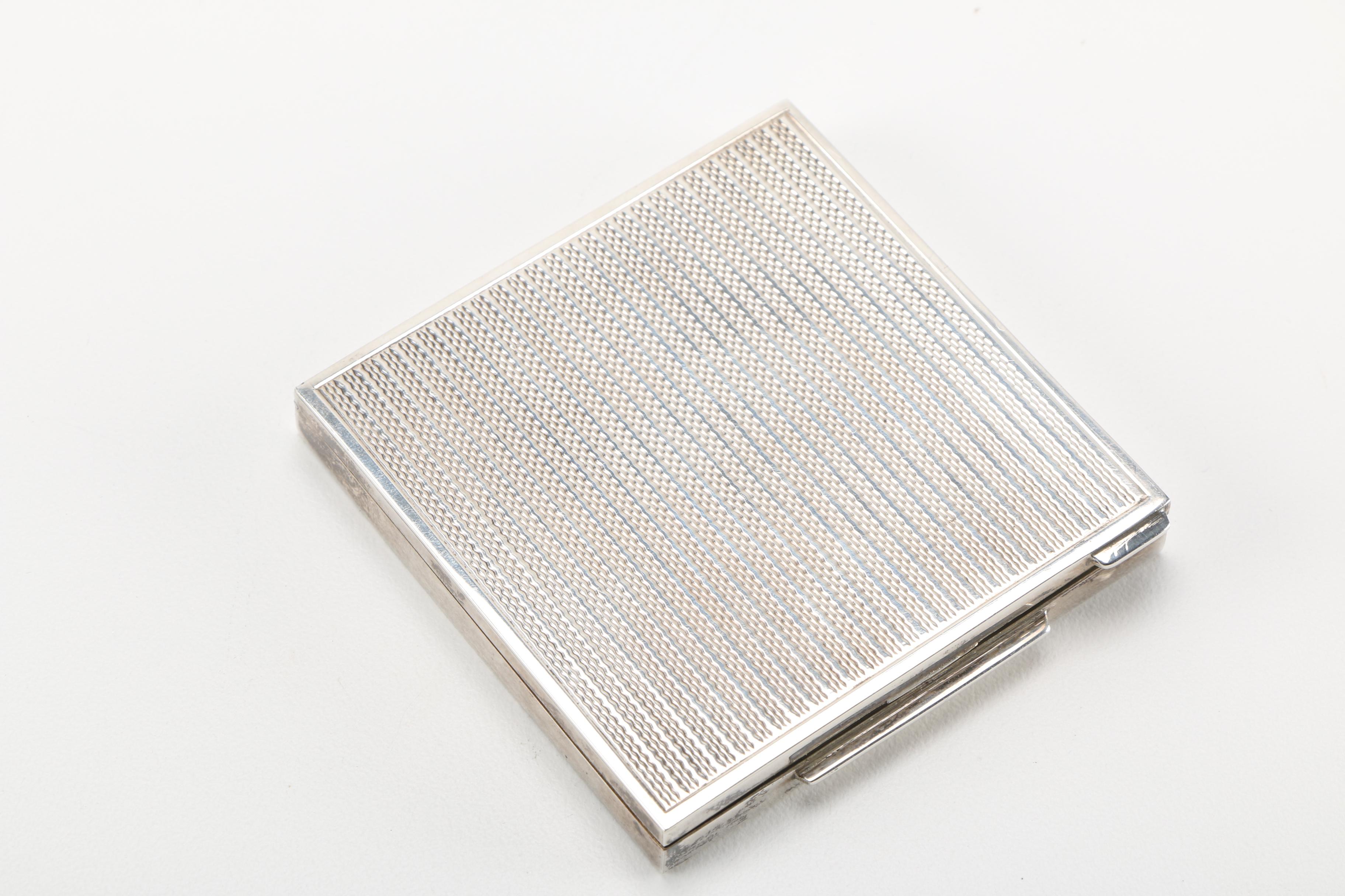 Three Gold Tone and Silver Tone Compacts