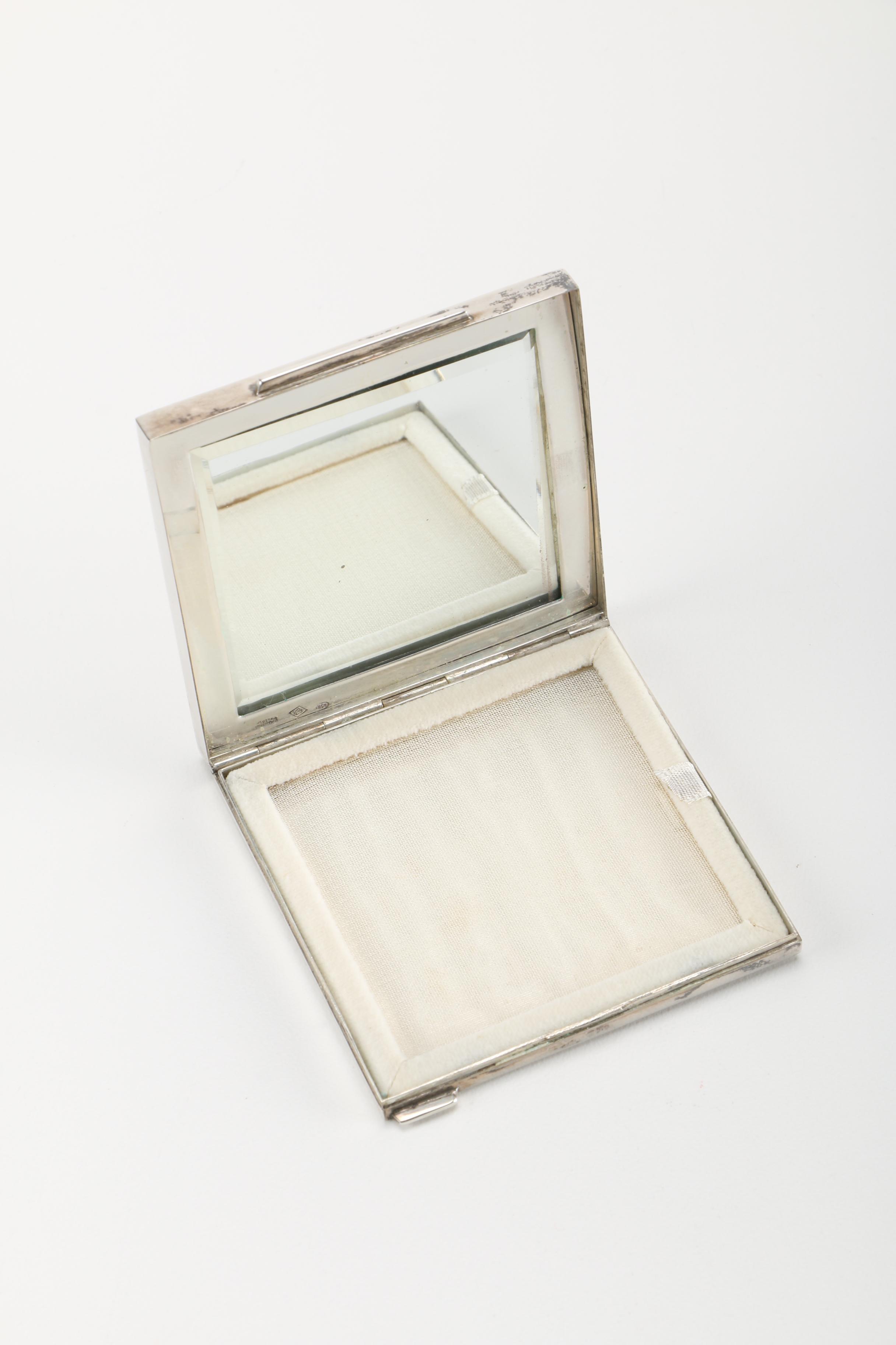 Three Gold Tone and Silver Tone Compacts