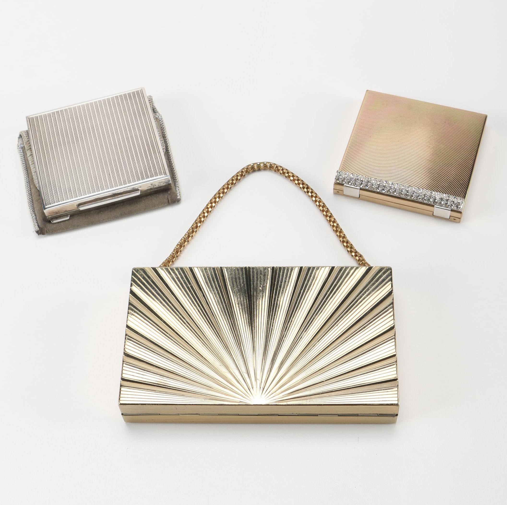 Three Gold Tone and Silver Tone Compacts