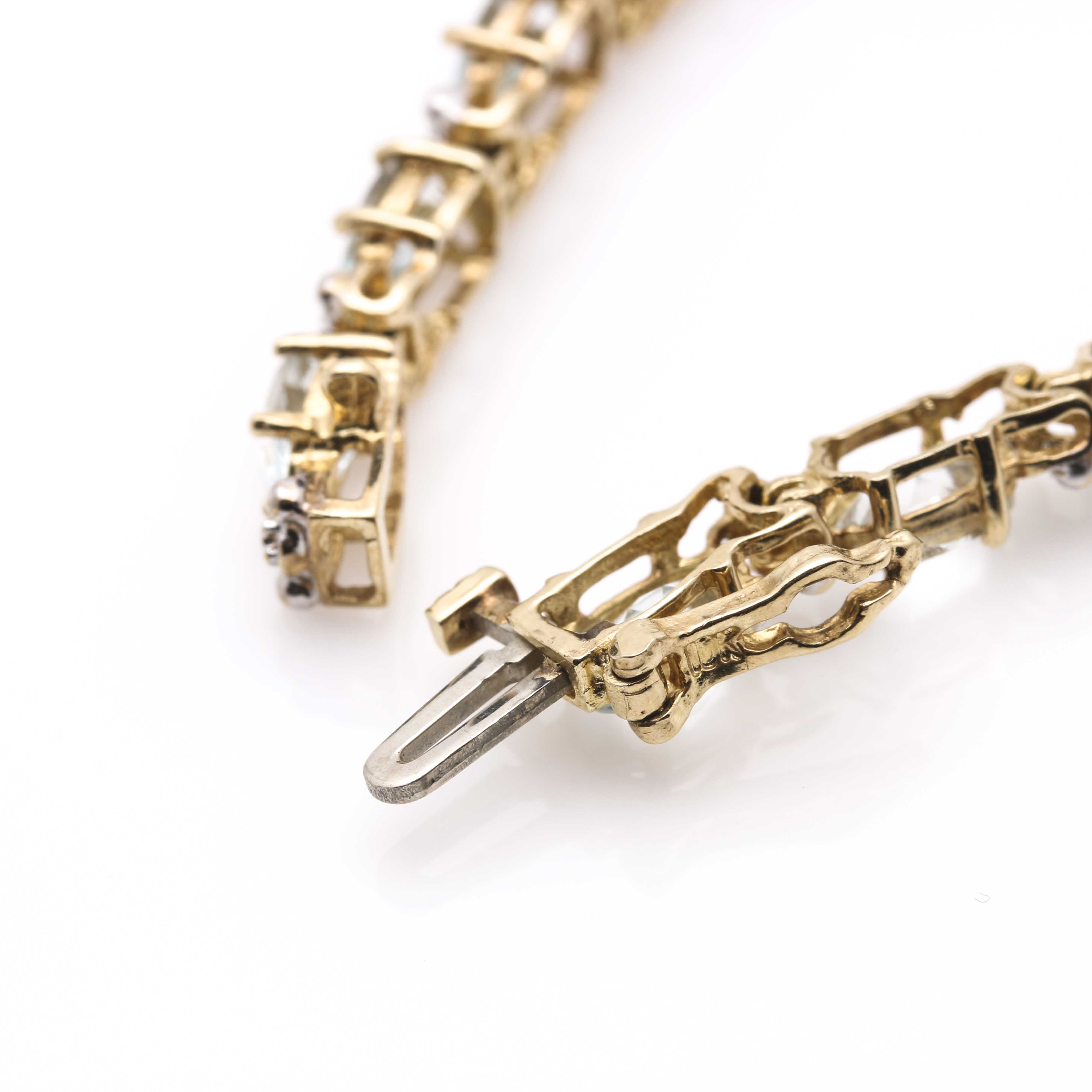 10K Two-Tone Gold Diamond and Aquamarine Line Bracelet