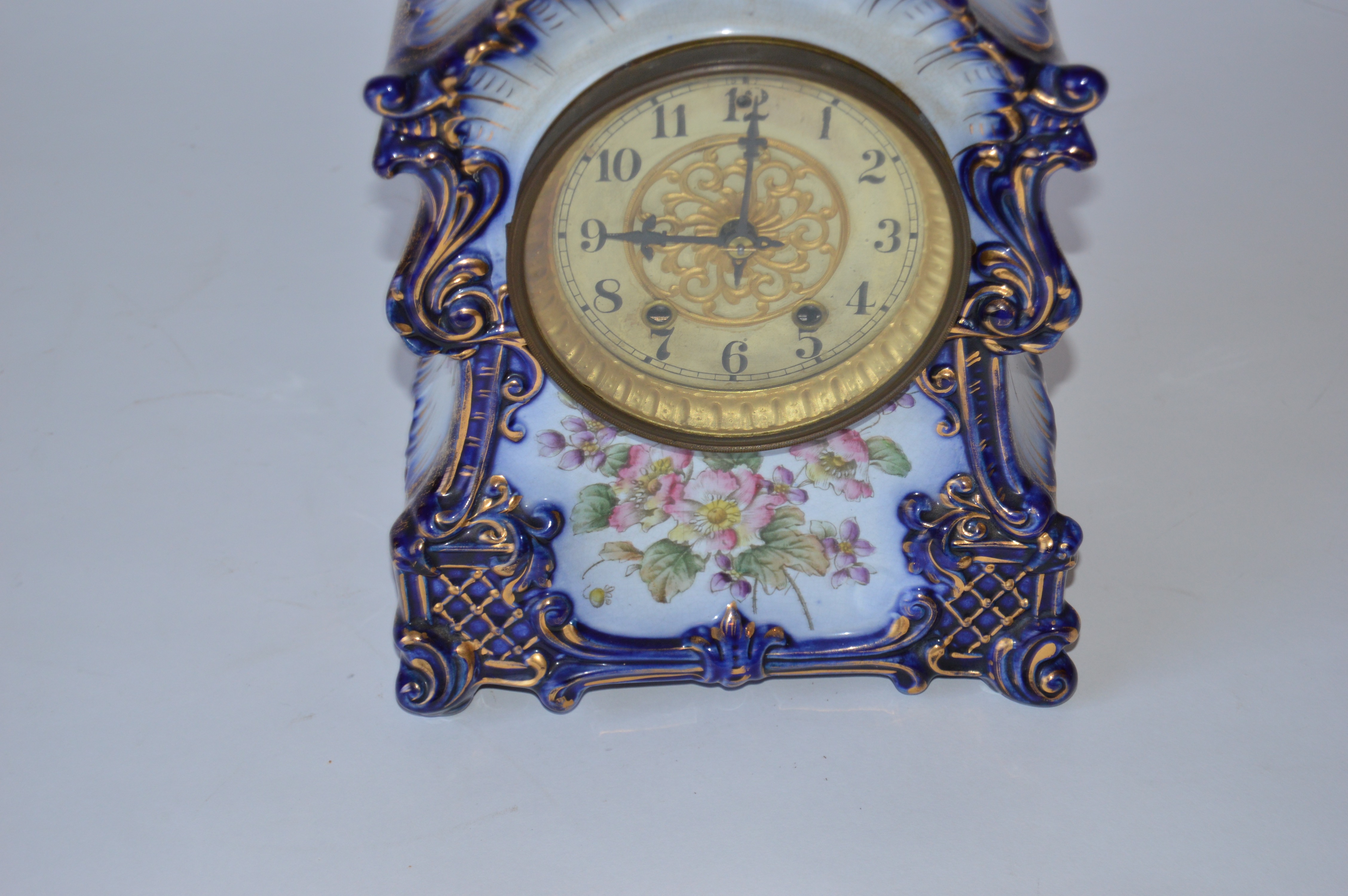 Antique Porcelain Mantel Clock by the Waterbury Clock Company