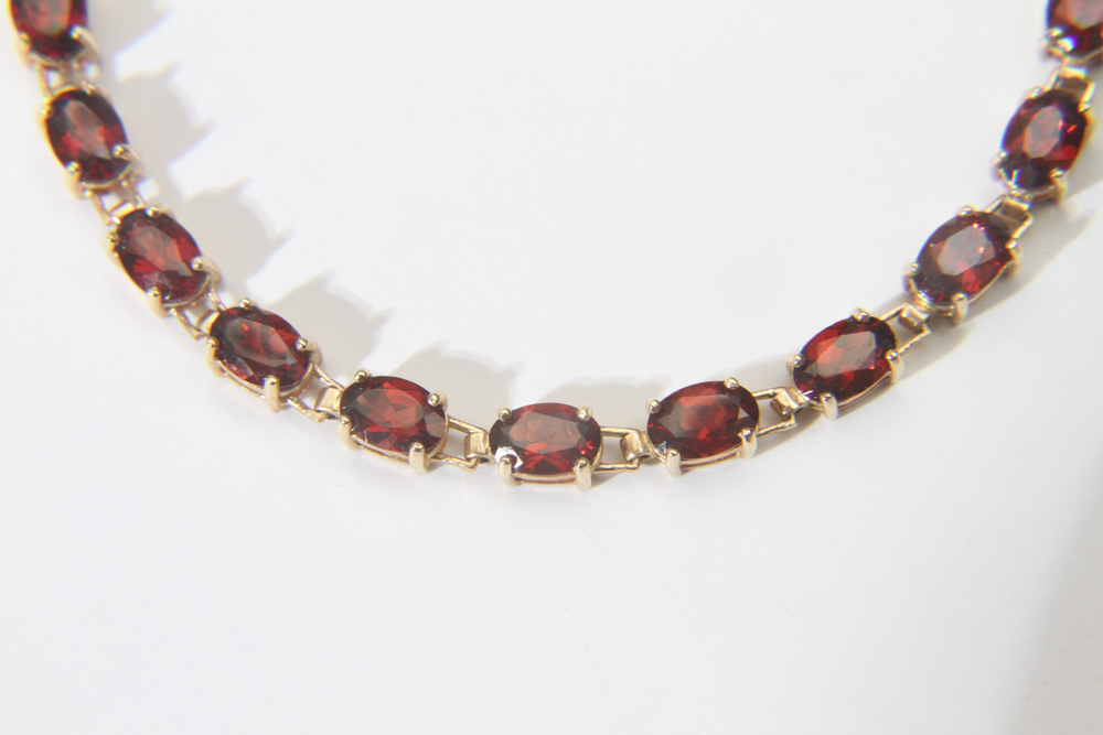 10K Gold and Garnet Tennis Bracelet