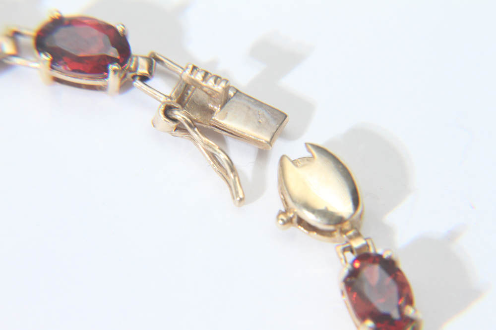10K Gold and Garnet Tennis Bracelet